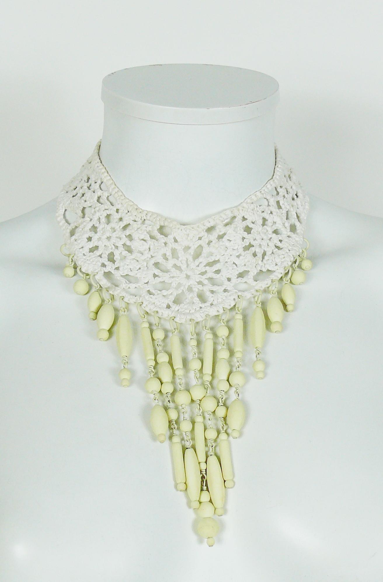 JEAN PAUL GAULTIER  gorgeous white crochet choker necklace embellished with an off white bead cascade.

Double-prong fastener

Marked JEAN PAUL GAULTIER.

JEWELRY CONDITION CHART
- New or never worn : item is in pristine condition with no noticeable