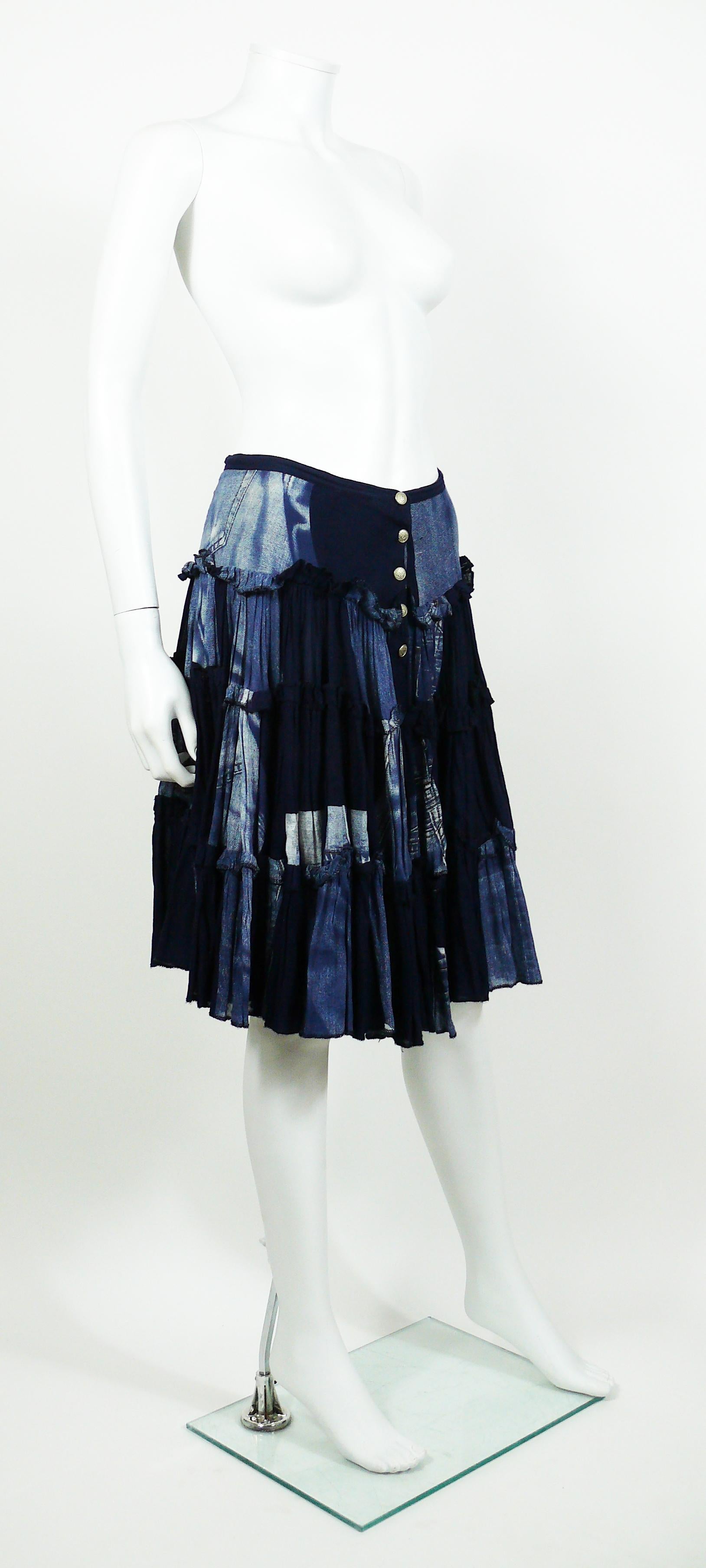 JEAN PAUL GAULTIER blue cotton ruffle skirt featuring an X-RAY screen trompe l’œil jeans on front and back.

This skirt features :
- Knee length.
- Front buttoning.
- Unlined.

Label reads GAULTIER JEAN'S Haute Jeanerie Tailored.
Made in