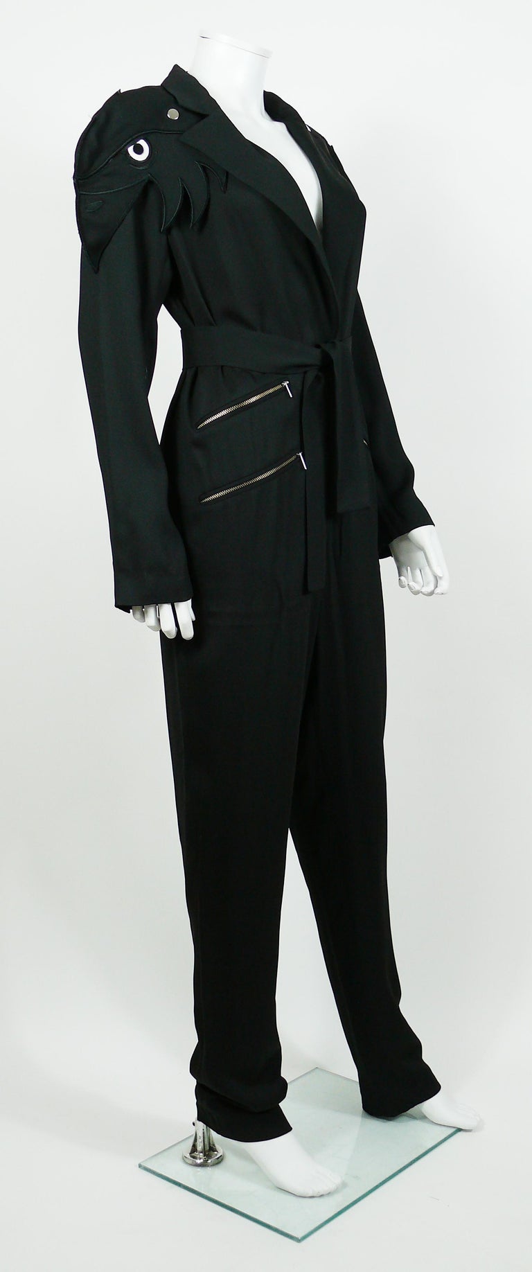 JEAN CHARLES DE CASTELBAJAC bird caps sleeves black jumpsuit.

Fall/Winter 2012 Collection.

This jumsuit features :
- Plunge neckline.
- Removable novelty bird sleeve caps - could be worn with or without (see photo 9).
- Three zippered pockets.
-
