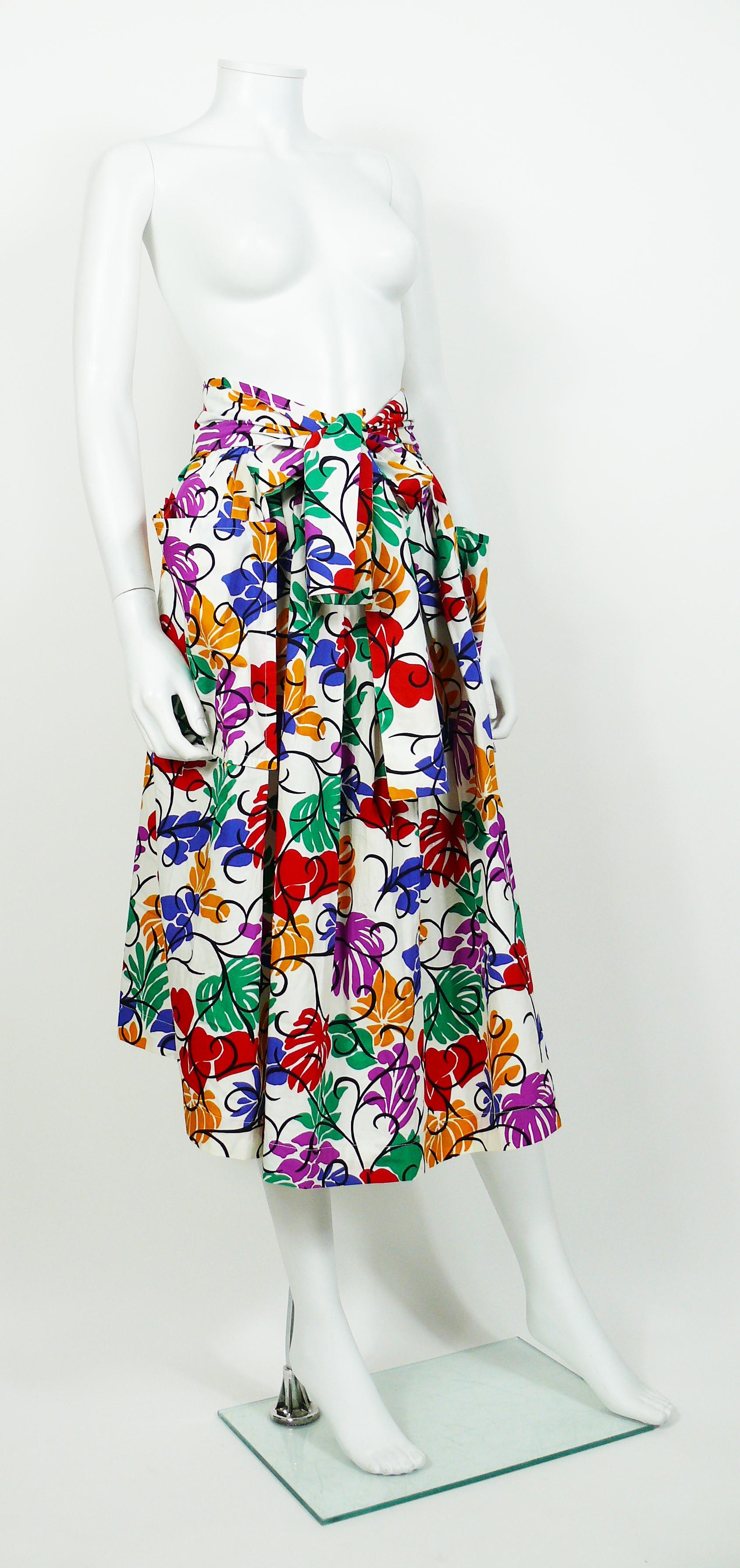 YVES SAINT LAURENT RIVE GAUCHE vintage skirt featuring a multicolored floral and heart print inspired by the cut-out artworks of HENRI MATISSE.

This skirt features :
- White cotton fabric with a bold multicolored all over opulent print.
-