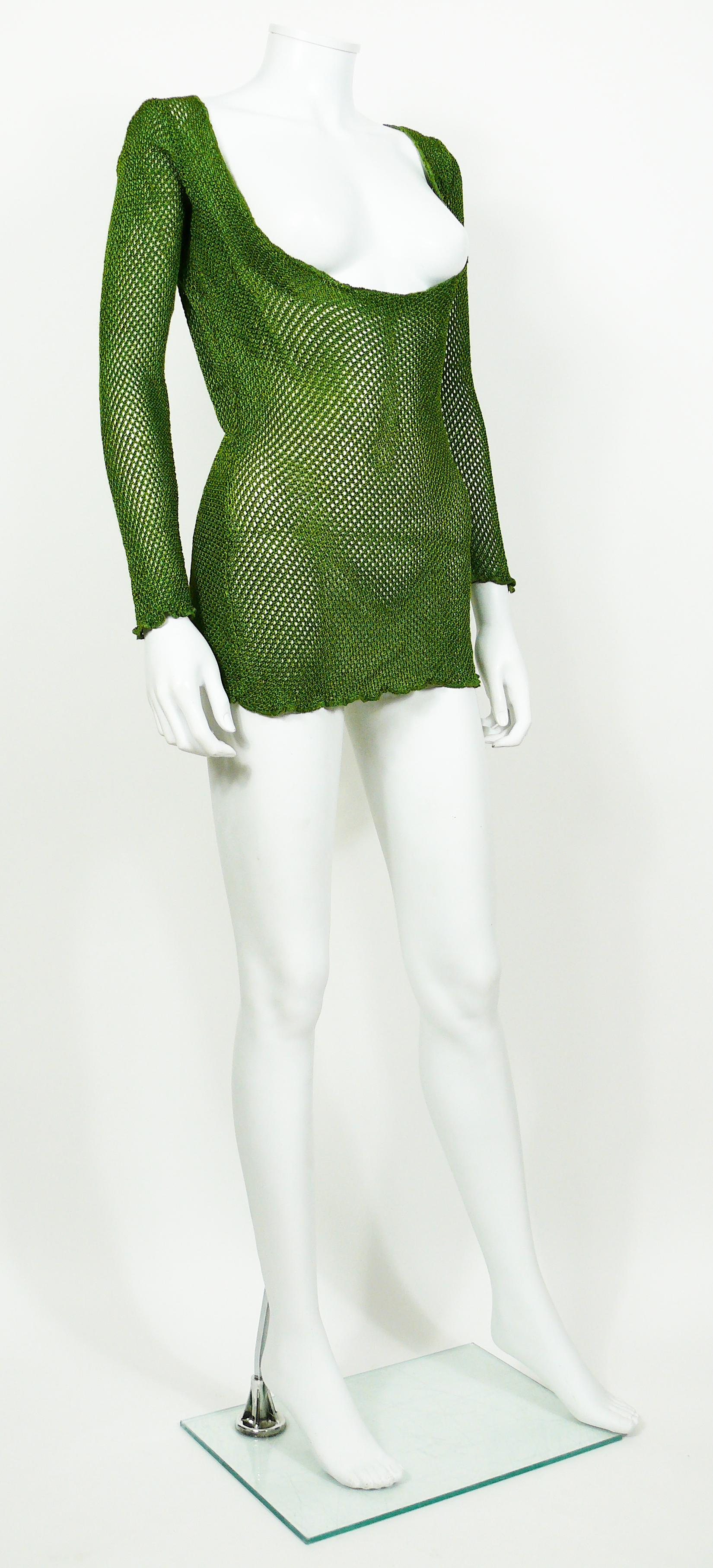 JEAN PAUL GAULTIER vintage 1990s green fishnet top.

Label reads JUNIOR GAULTIER Made in Italy.

Size tag reads :46.
Please refer to measurements.

Composition tag reads : 98% Viscose / 2% Elastan.

Indicative measurements taken laid flat and
