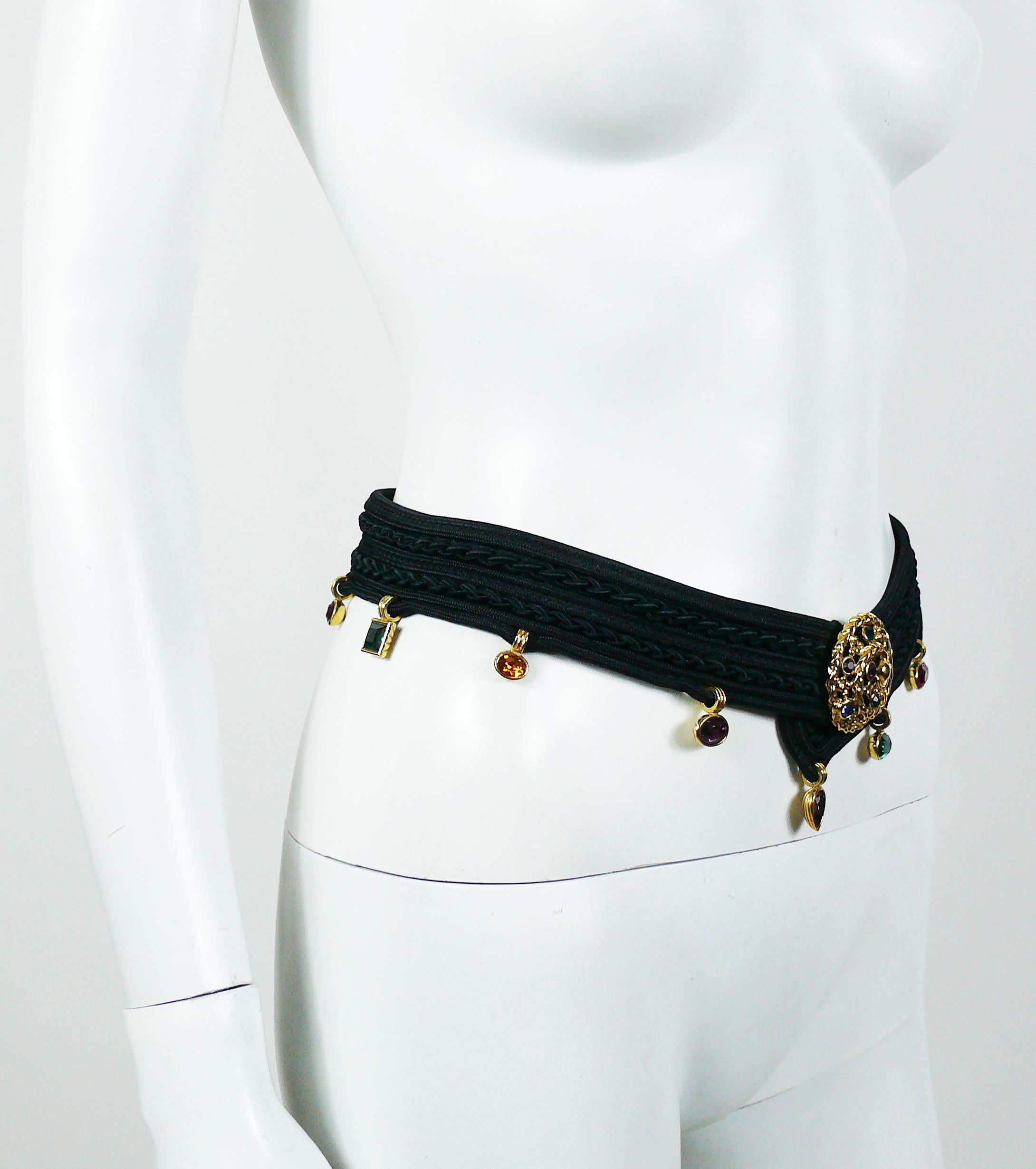 YVES SAINT LAURENT Rive Gauche vintage black passementerie belt featuring multicolored crystal embellishement.

Hook clasp closure.

Marked YVES SAINT LAURENT Rive Gauche.

Indicative measurements : length approx. 70 cm (27.56 inches) / strap width