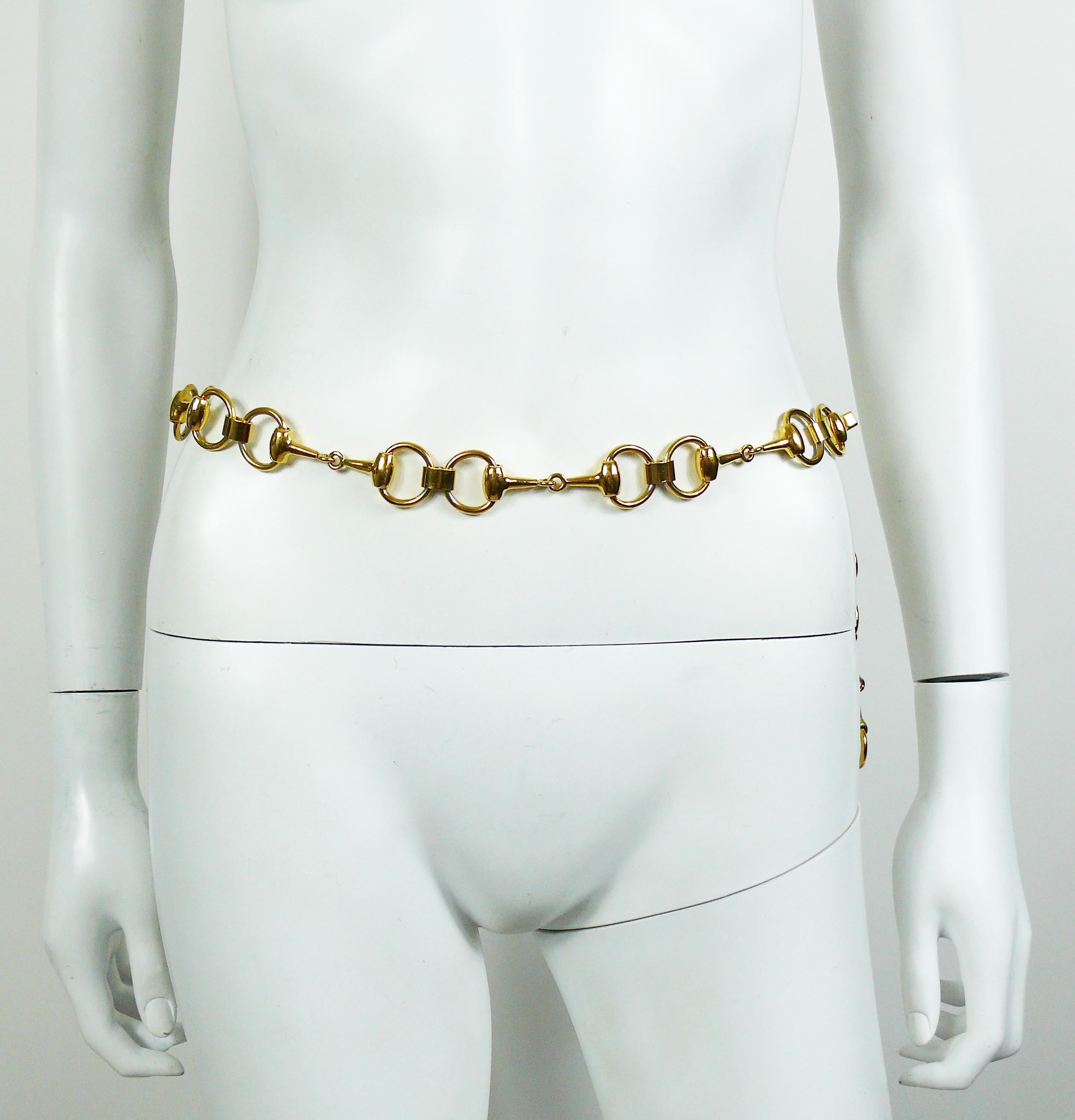 Gucci vintage gold toned horse bit design chain belt/necklace.

Adjustable length.
T bar closure featuring a nail design.

Embossed Gucci Italy.

Indicative measurements : max. length approx. 90 cm (35.43 inches) / max. width approx. 2.2 cm (0.87