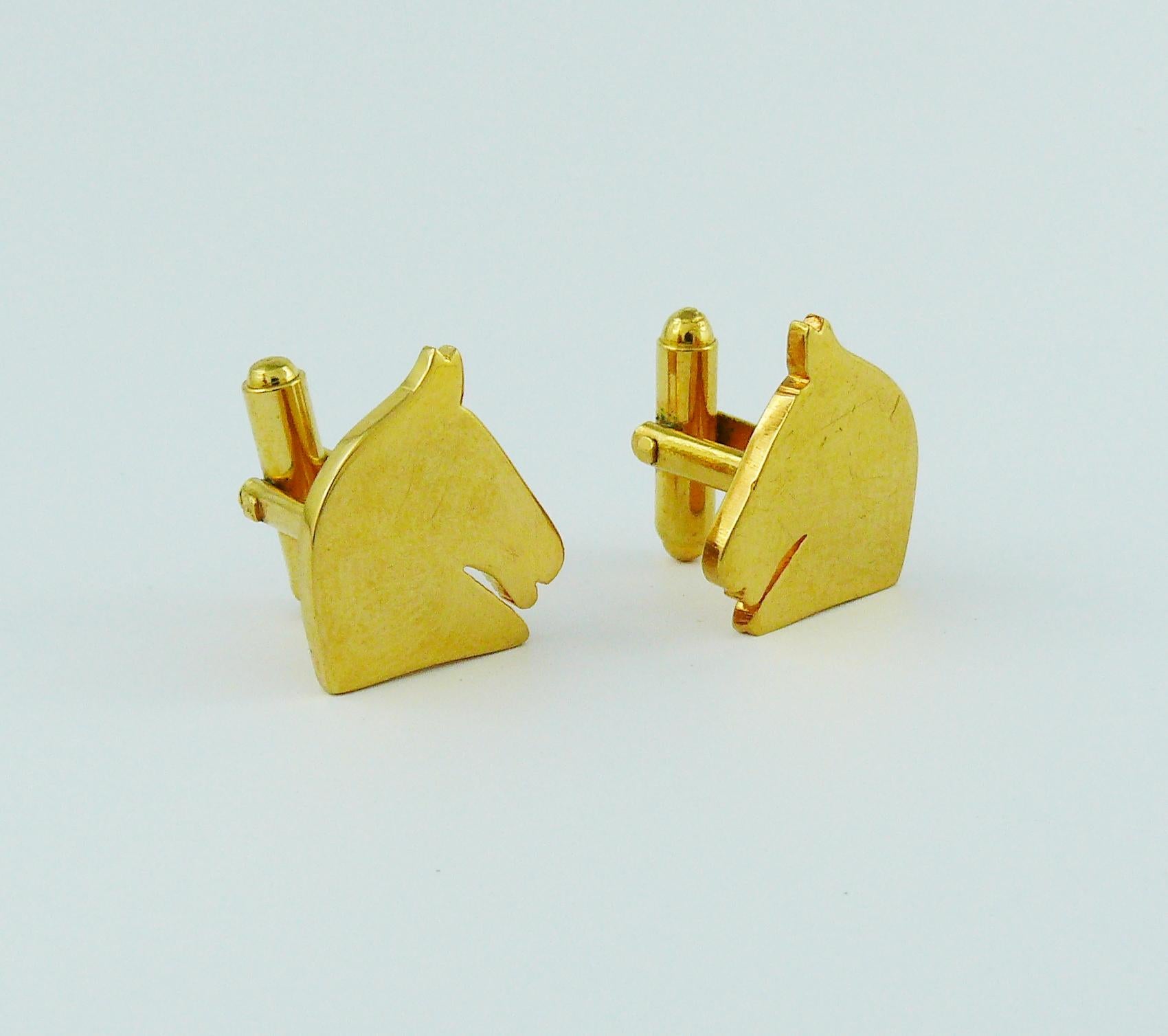 HERMES Paris vintage polished gold toned equestrian cufflinks.

Embossed HERMES Paris Bijouterie Fantaisie.

Indicative measurements : max. 1.7 cm (0.67 inch) x max. 1.9 cm (0.75 inch).

JEWELRY CONDITION CHART
- New or never worn : item is in