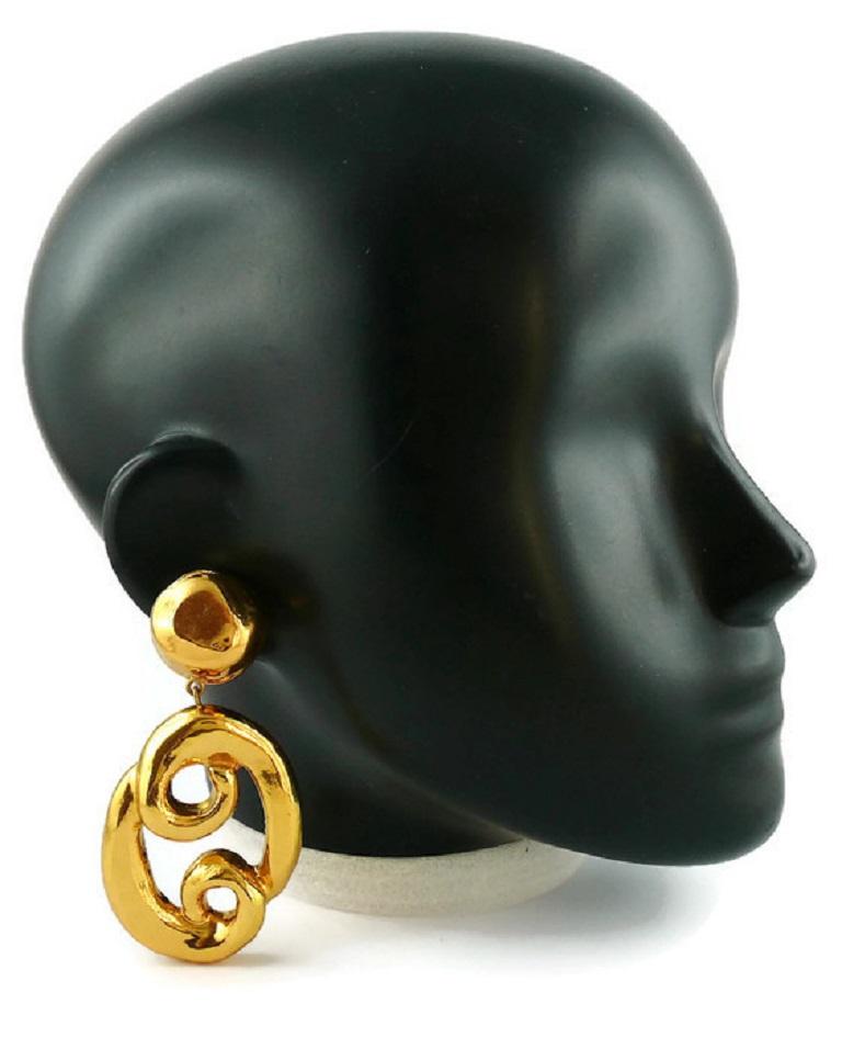 CHRISTIAN LACROIX vintage gold toned massive dangling earrings (clip-on) featuring a 