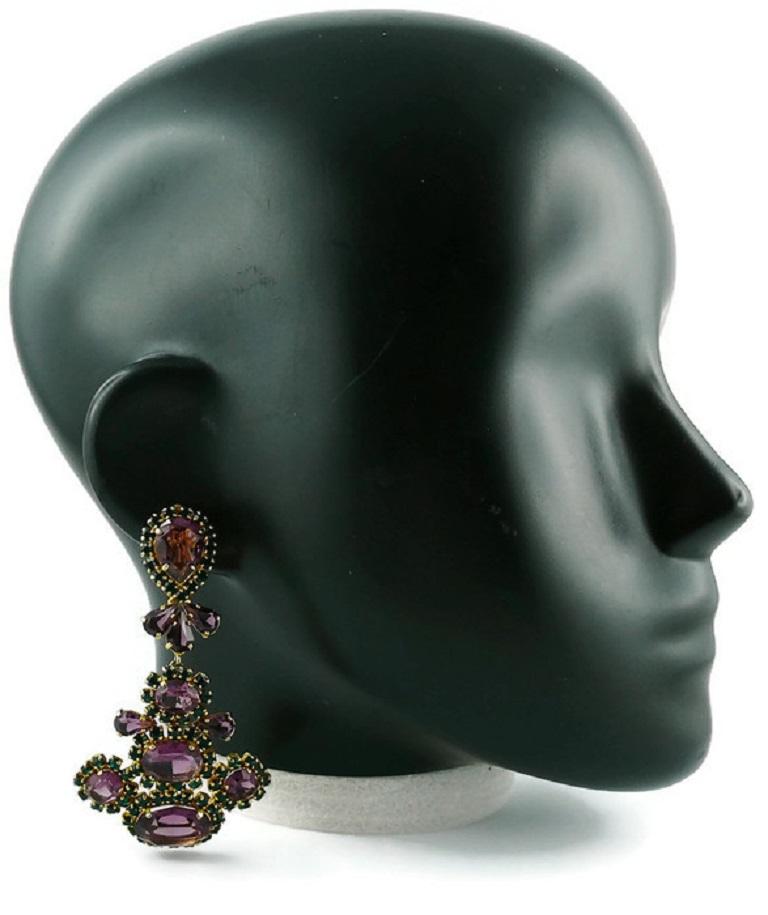 CHRISTIAN DIOR vintage rare massive dangling earrings (clip-on) embellished with purple and green crystals in a gold toned setting.

Marked © CHR. DIOR Germany.

Indicative measurements : height approx. 8 cm (3.15 inches) / max. width approx. 4.5 cm
