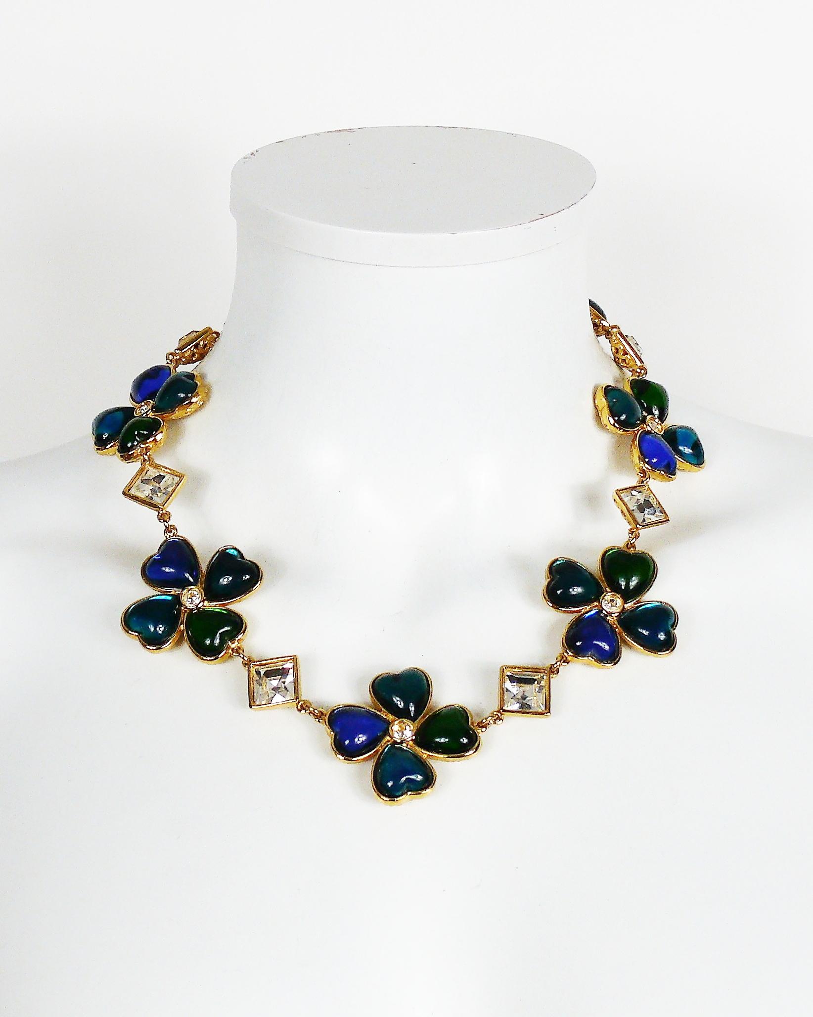YVES SAINT LAURENT vintage rare gold toned necklace featuring green-blue resin clovers and hearts with clear crystal embellishement.

Gorgeous gold toned filigree work on the reverse (can be worn on this side - as shown on photo 9).

Love clasp and
