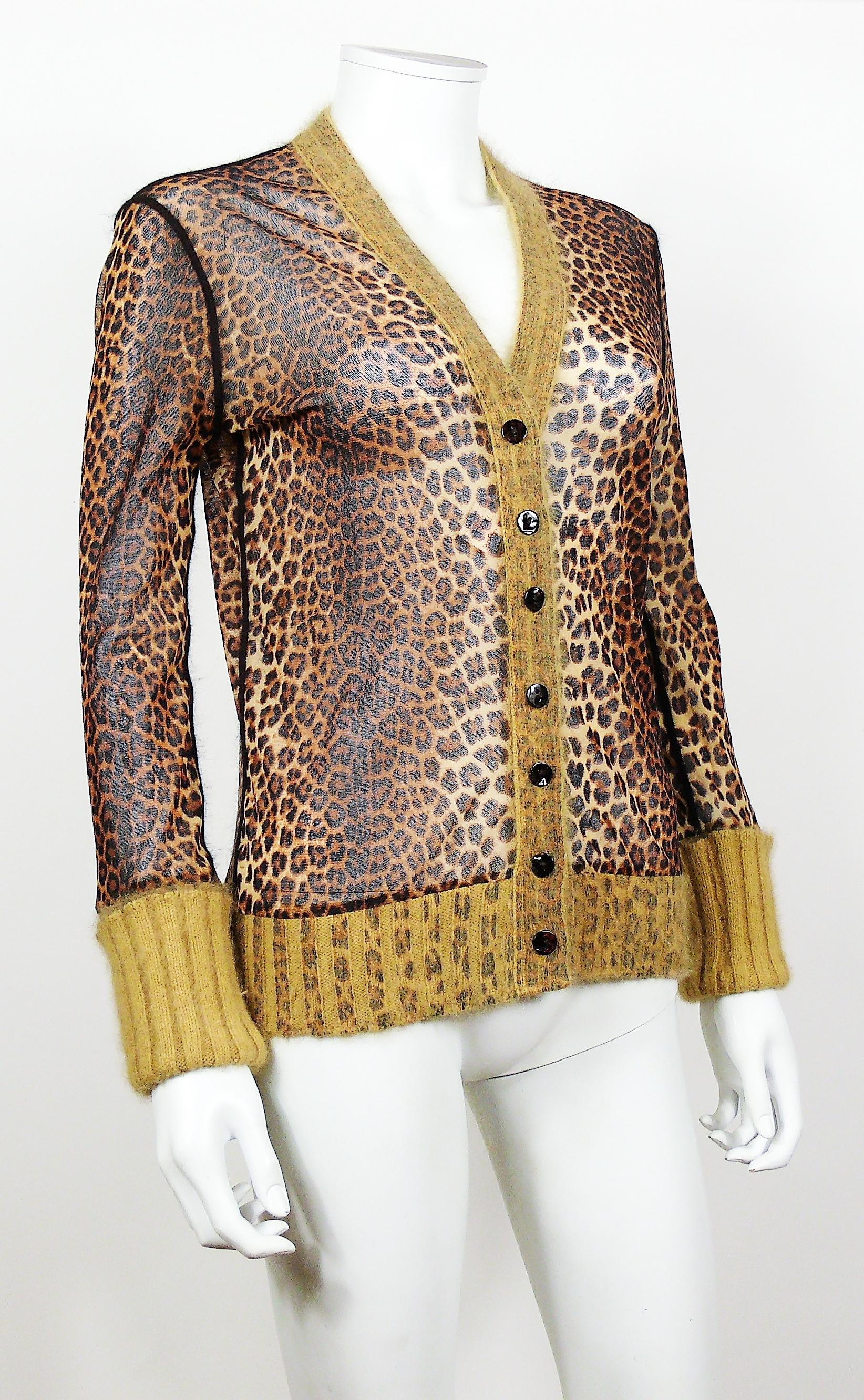JEAN PAUL GAULTIER Fuzzi sheer mesh cardigan with cheetah print featuring fantastic angora wool collar, cuffs and bottom.

Label reads JEAN PAUL GAULTIER Maille Femme Made in Italy.

Size tag reads : M.

Composition tag reads : 100%
