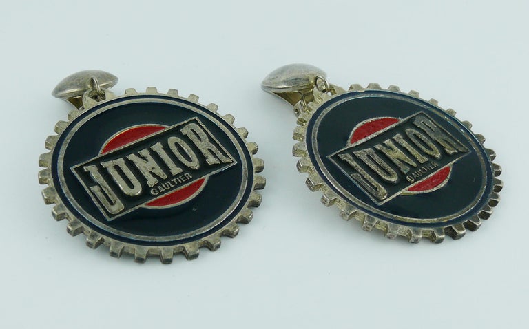 JEAN PAUL GAULTIER vintage antiqued silver toned dangling earrings (clip-on) featuring a large gear marked JUNIOR GAULTIER embellished with navy blue and red enamel.

Unsigned on the reverse side.

Indicative measurements : height approx. 7 cm (2.76