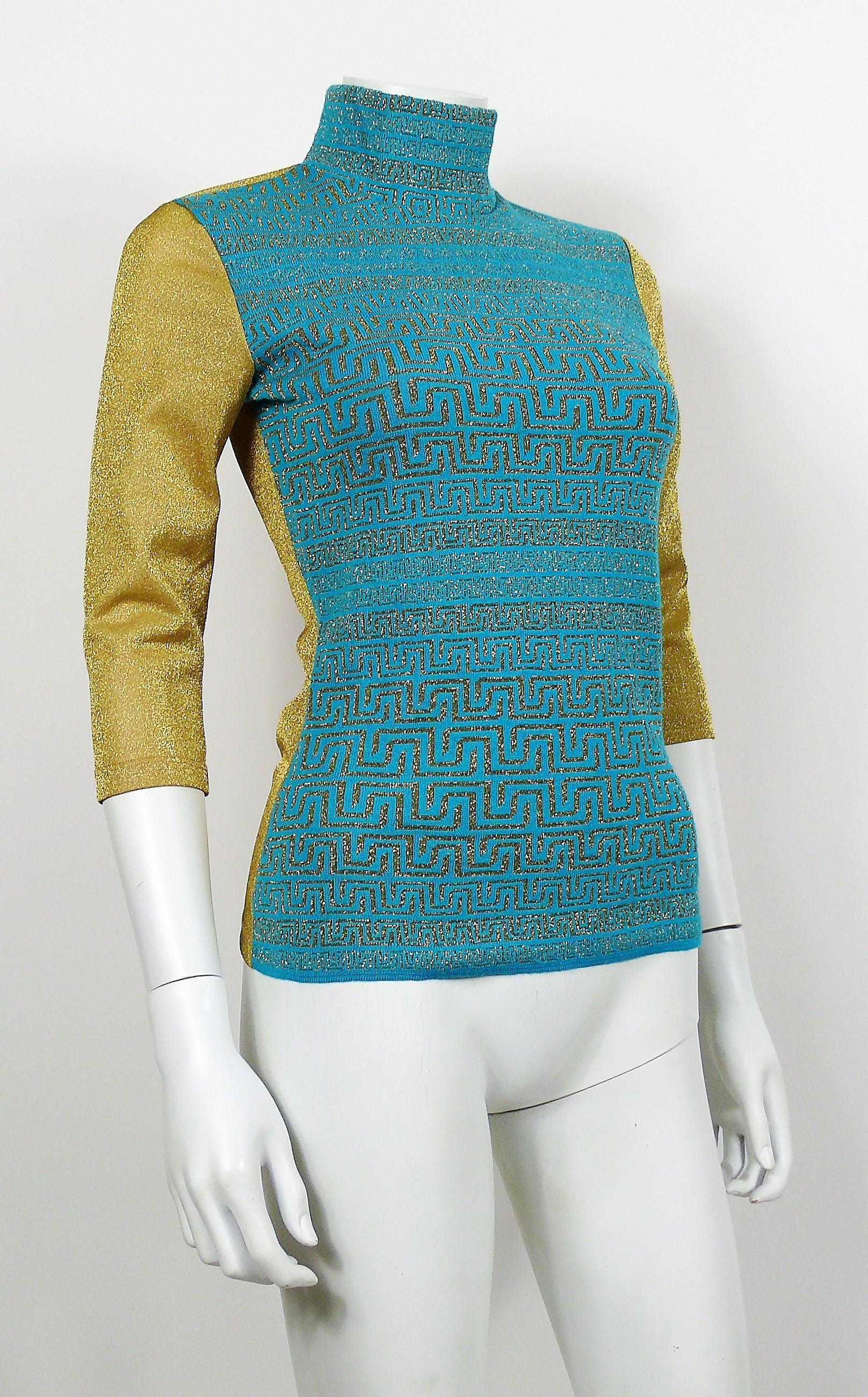 VERSACE JEANS COUTURE vintage blue and gold lurex top featuring an ancient greek pattern.

This top features :
- Blue knitted front with gold lurex ancient greek pattern.
- Gold lurex sleeves and back.
- Turtleneck.
- Elbow length sleeves.

Label