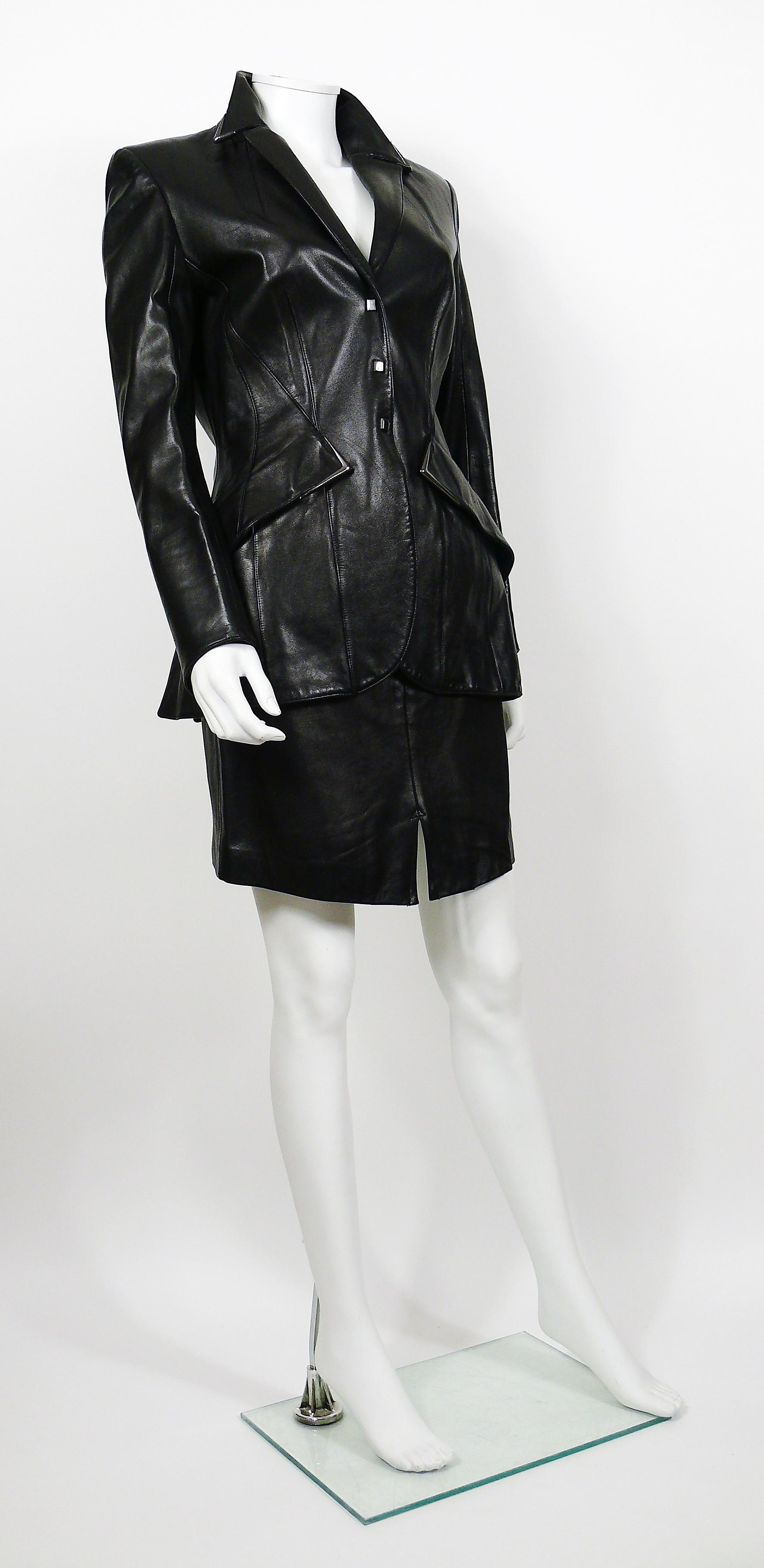 THIERRY MUGLER vintage black lambskin leather skirt and blazer suit.

BLAZER features :
- Tailored fitted cut.
- Front snap buttoning.
- Two pockets.
- Gorgeous metal details on collar and pockets.
- Long sleeves.
- Shoulder pads.
- Fully