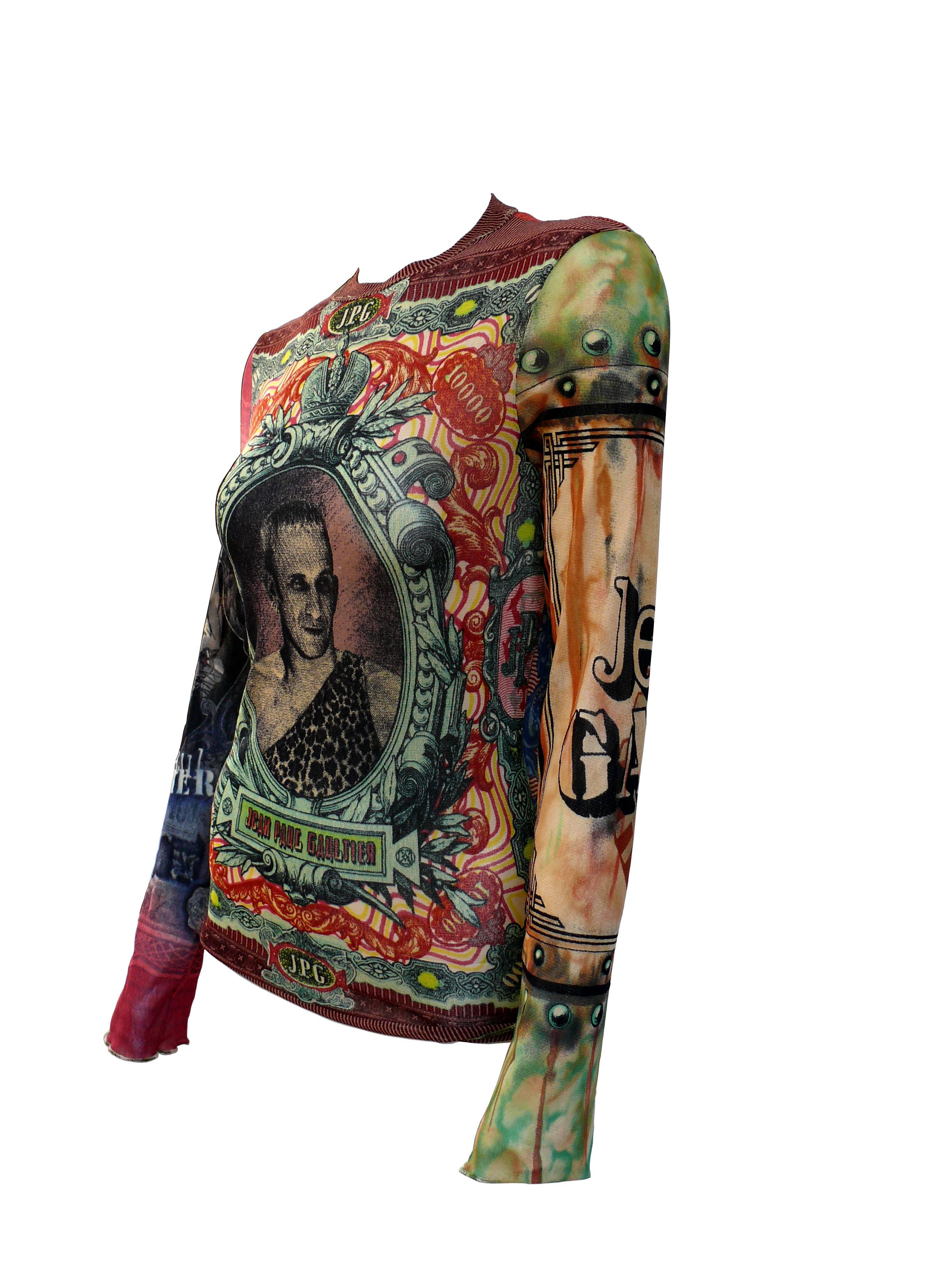JEAN PAUL GAULTIER vintage unisex self portrait tattoo Fuzzi mesh top, featuring an opulent decor with vibrant colors.

Label reads Jean Paul Gaultier Maille Made in Italy.

Size tag reads : XL.
Please refer to measurements.

Composition tag