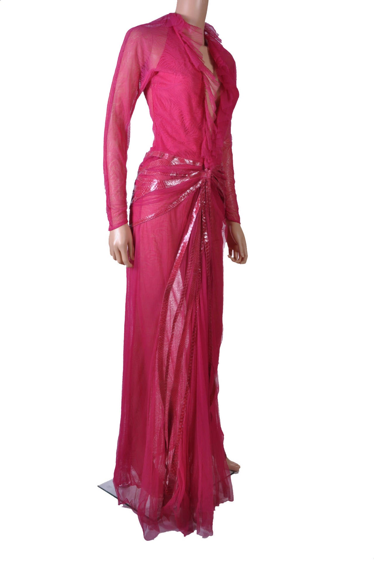 Versace 

Collectible Gown from Iconic 2000 Fall collection

Pink Lace Gown with Snakeskin detail

Versace is known for its floor-skimming gowns. 

Make an entrance at your next formal occasion with this sexy version of the house's iconic