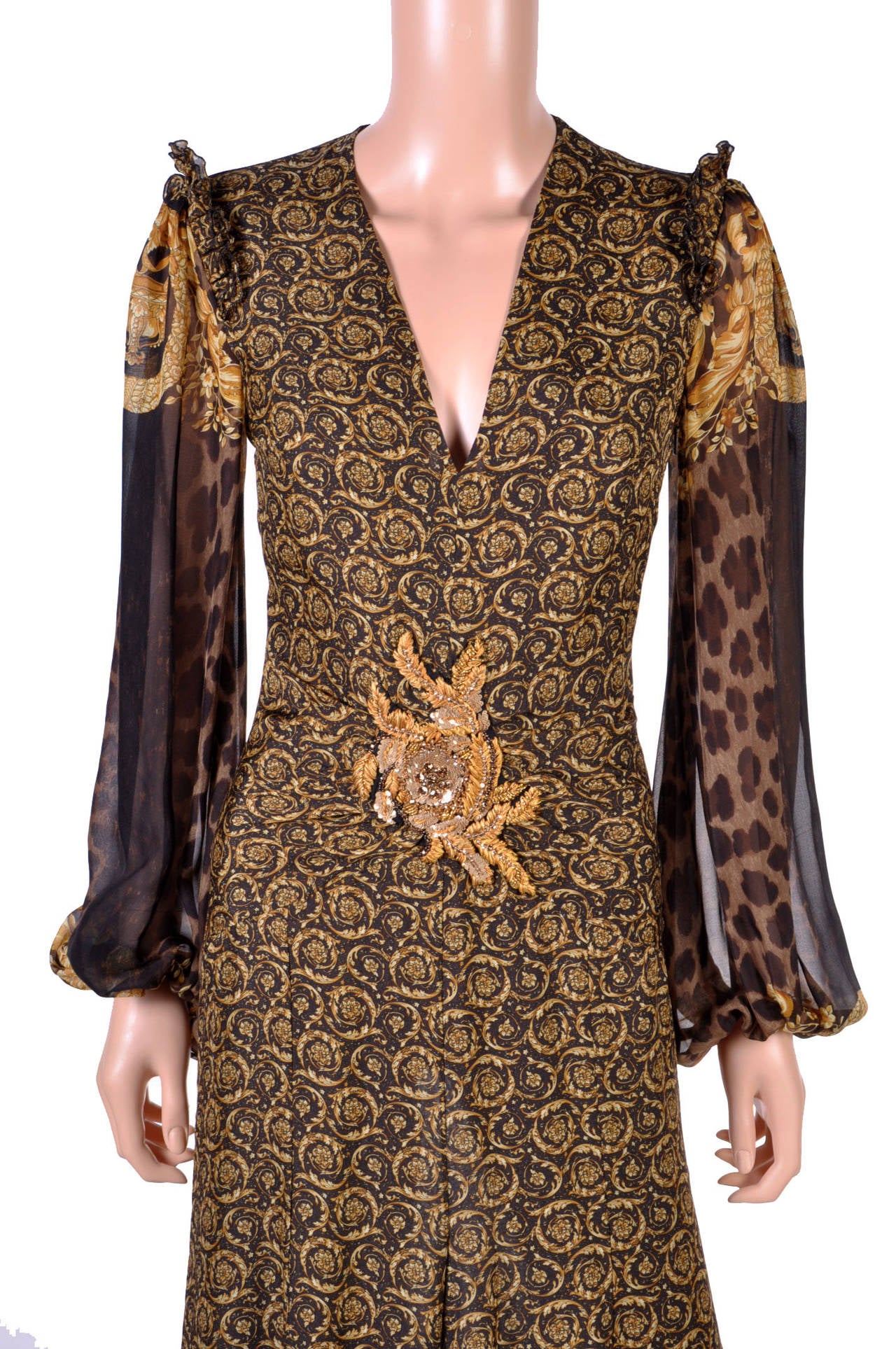 clad in versace gown
