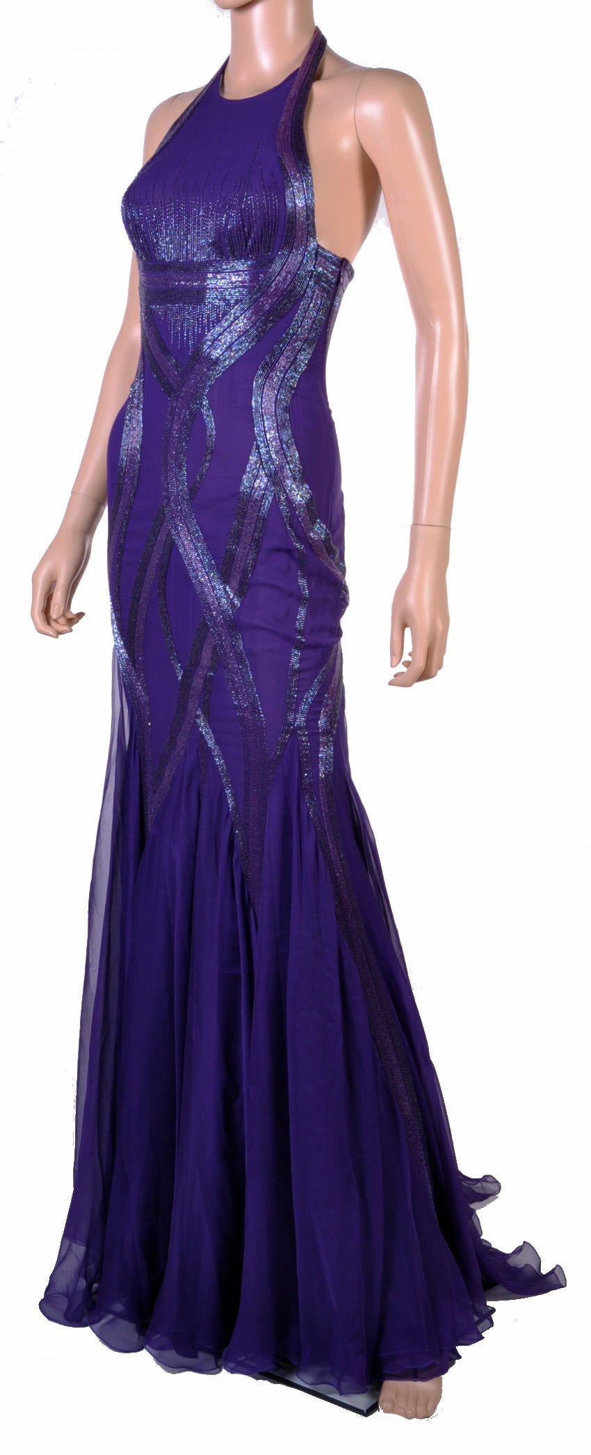 BRAND NEW VERSACE DRESS

Rich purple color, mermaid design and artfully embellished body 

with open back - ensure 

a stunning silhouette. 

Size 38

Made in Italy

New, with tags

Retail price is $12,735.00