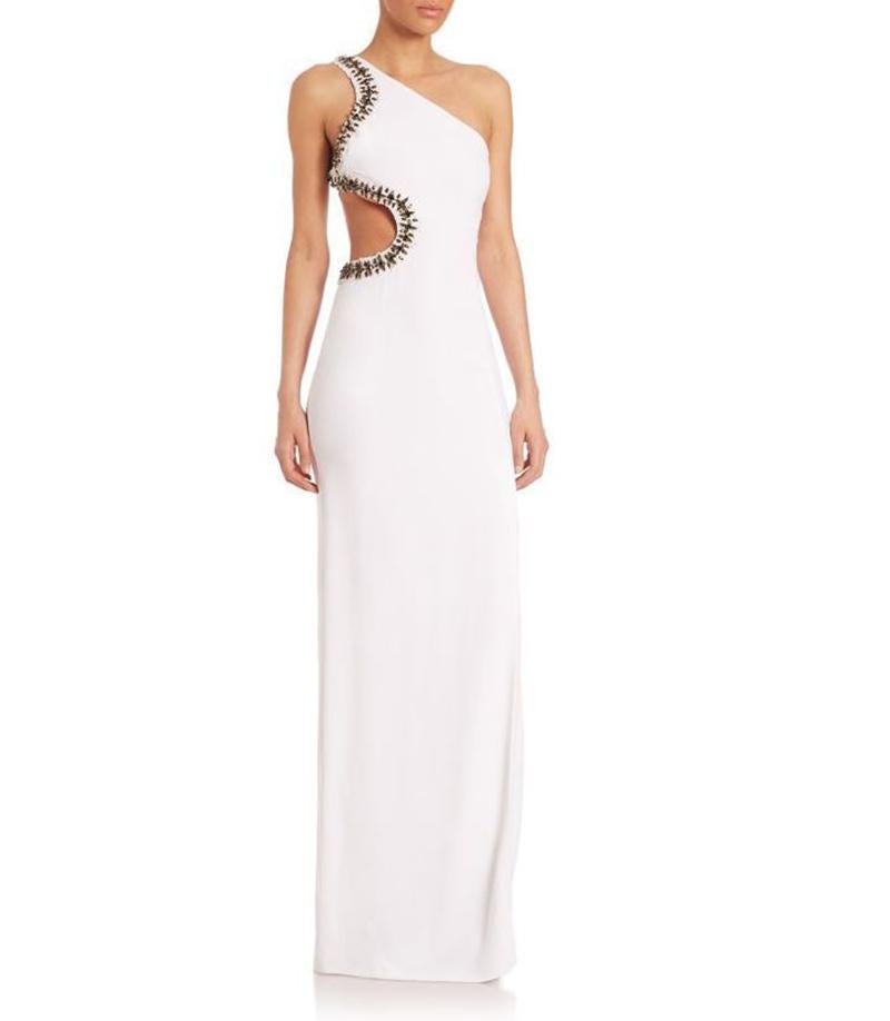 Roberto Cavalli 

Stunning cutout gown with embellishments

Asymmetric shoulder

Concealed side zipper

Viscose/elastane

Made in Italy

Size 40 - US 4

New, with tags.