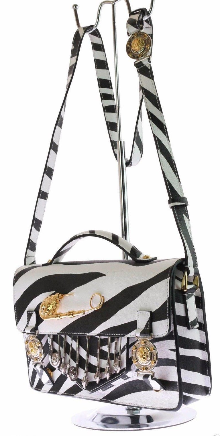 VERSUS VERSACE Safety Pin Embellished Zebra print Saffiano Leather School Bag at 1stDibs