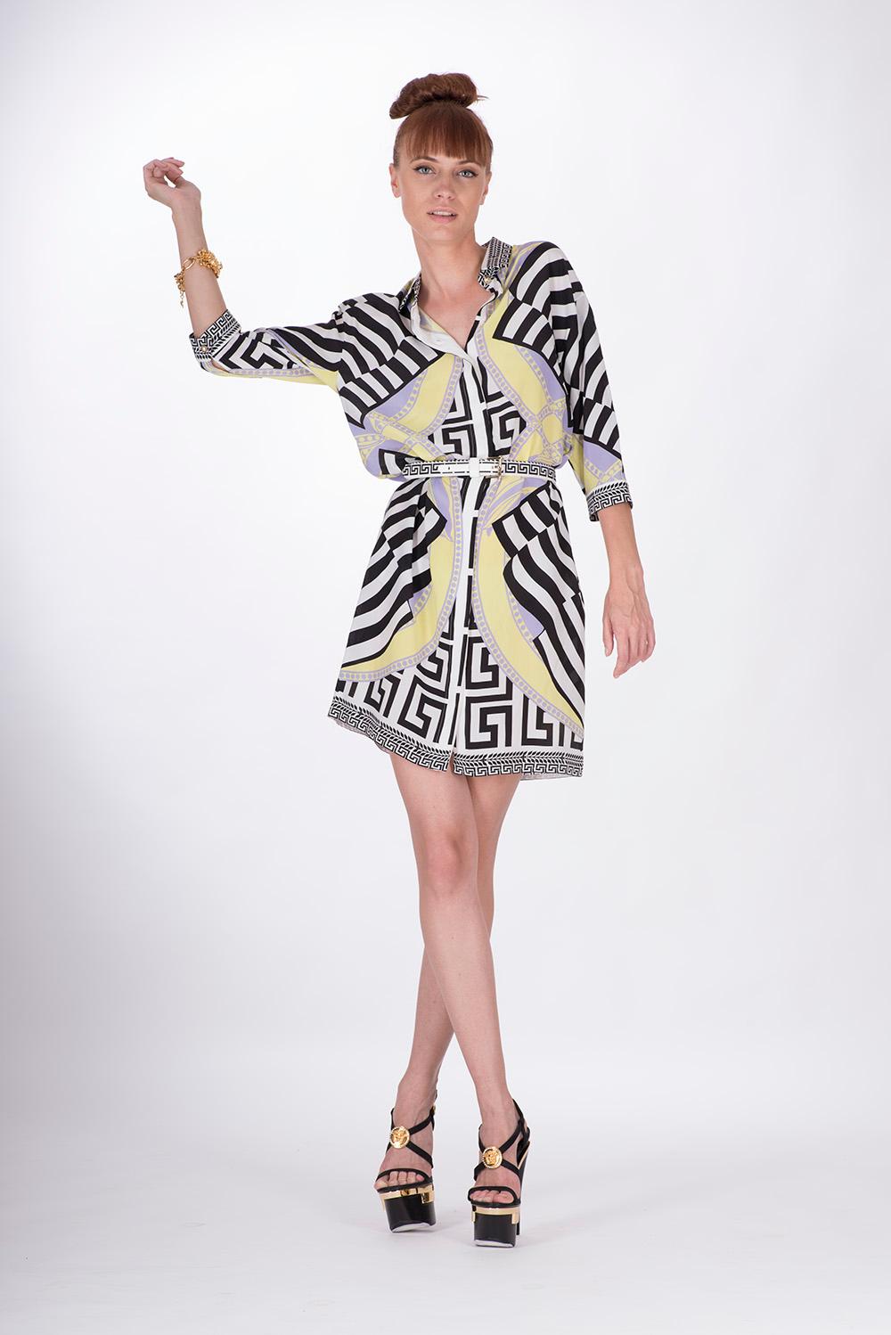 Versace 

Shirt dress with 3/4 sleeves, colorful graphic print and loose cut.

