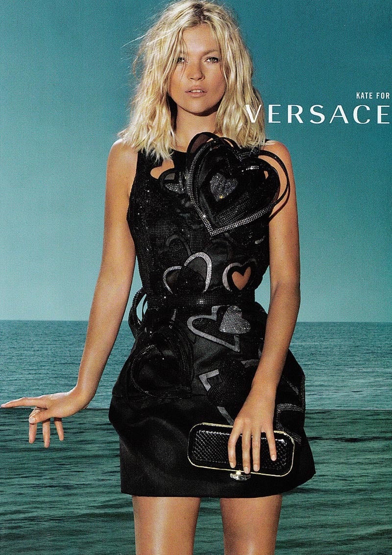 VERSACE Queen of Hearts Dress
Bringing Versace’s inimitable appeal to
evening wear this black dress showcases
glimmering hearts. The dose of texture
brings an element of surprise to this classic
shape and brings a playful feel to a black-
tie event.