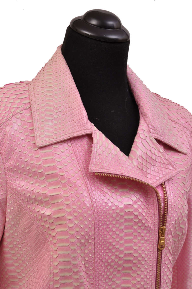 NEW VERSACE PYTHON JACKET

Exquisitely luxurious in glamorous pink python, Versace's jacket radiates impossibly chic results. 
Genuine snakeskin.
Medusa silk lining. 

Tailored feminine fit.

Size 40 - US 4

Retail price is