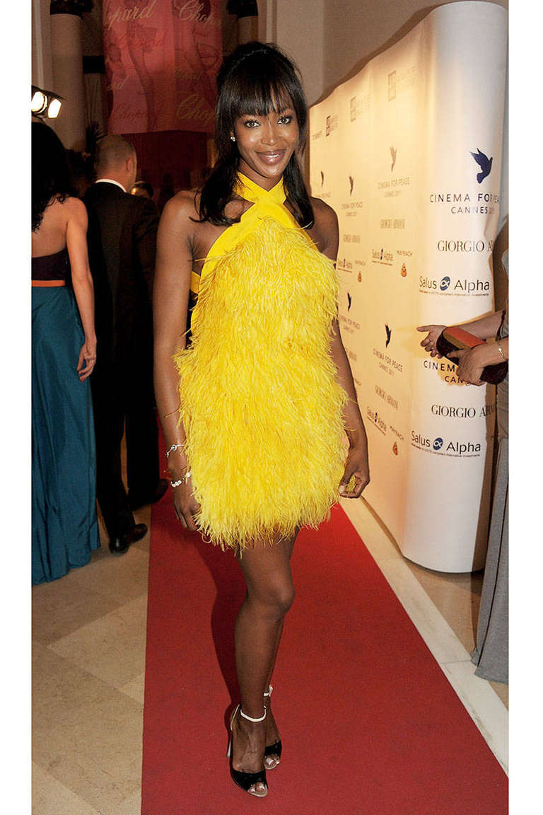 yellow dress with feathers