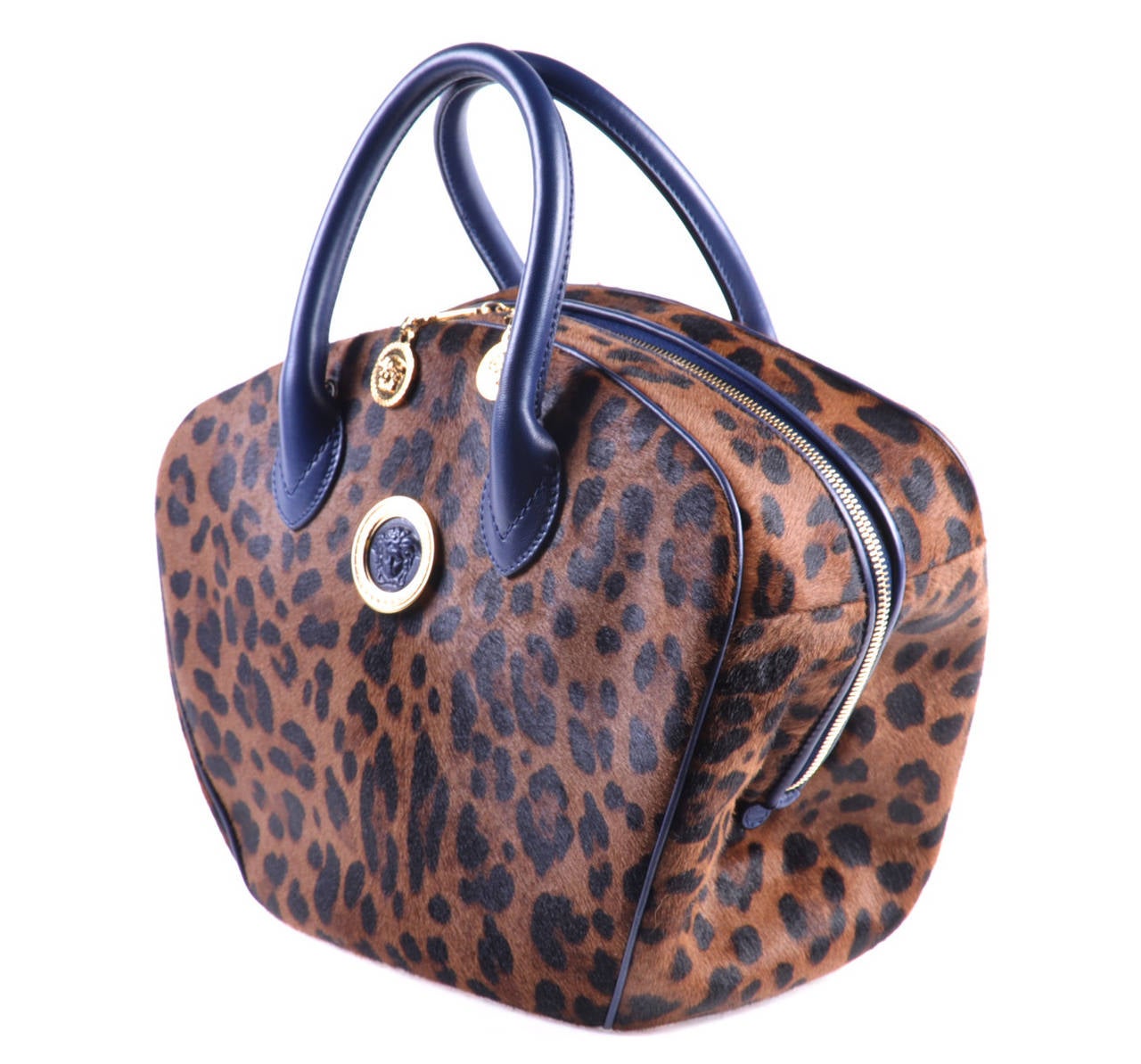 VERSACE

 Versace handbag

Calf hair

Animal print

Blue leather trim

Black silk lining.

Two inner pockets.

Made in Italy.

 MEASUREMENTS Height: 11 Length: 15in  Depth: 7in