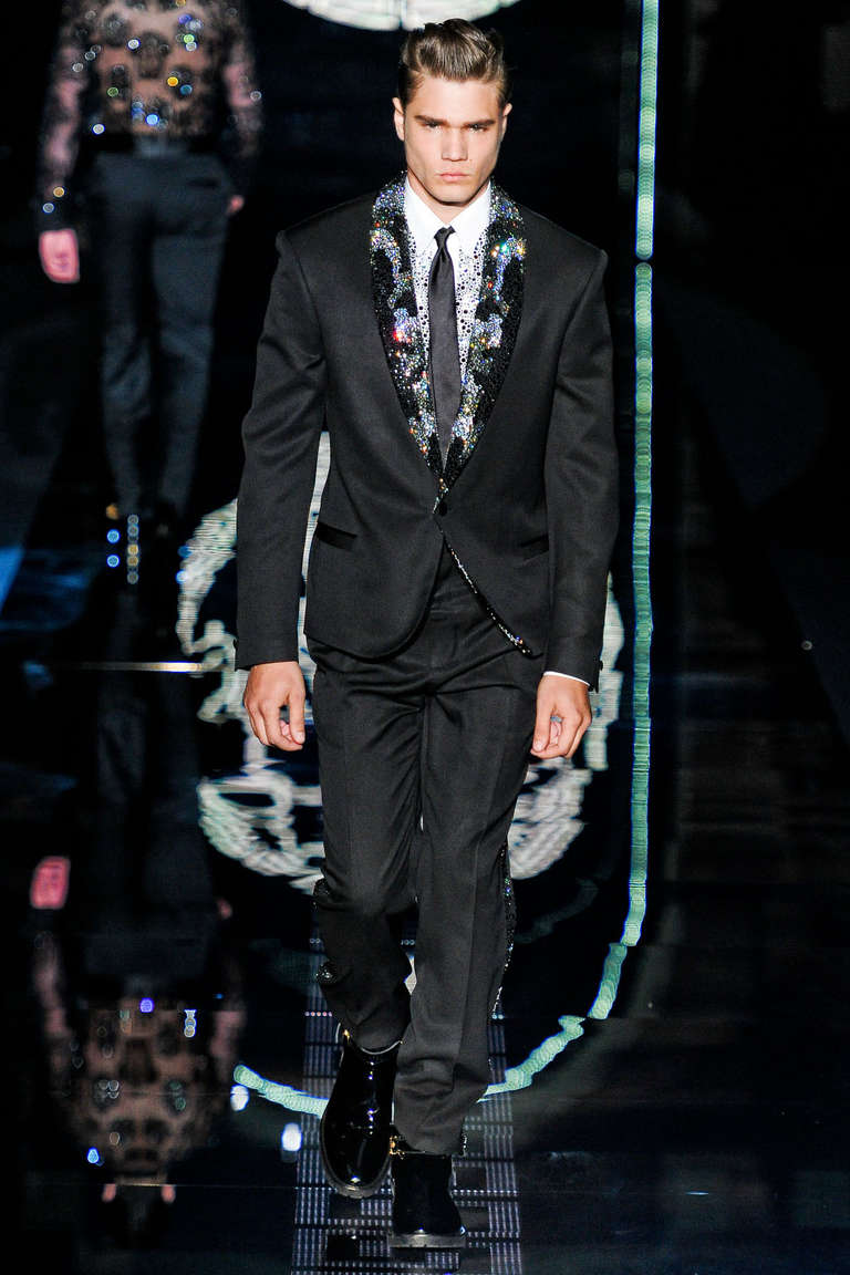 VERSACE  MEN'S TUXEDO

CRYSTAL EMBELLISHED

TAYLOR MADE
100% wool, 100% silk

The jacket features: single-breasted Italian design, two side pockets, one chest pocket, one button sleeves and 3 inner finished pockets.  

Medusa