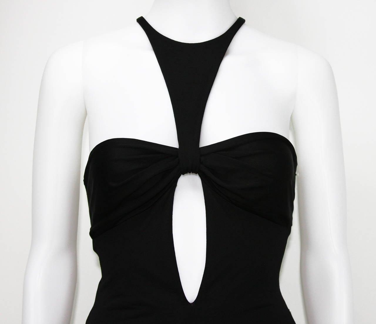 TOM FORD for GUCCI BLACK JERSEY DRESS GOWN

TOM FORD'S FINAL COLLECTION FOR GUCCI – FALL/WINTER 2004
THE WHITE, BEADED VERSION OF THIS DRESS WAS WORN BY ROBIN WRIGHT AT THE CANNES FILM FESTIVAL IN 2004
ITALIAN SIZE 40
COLOR – BLACK
JERSEY