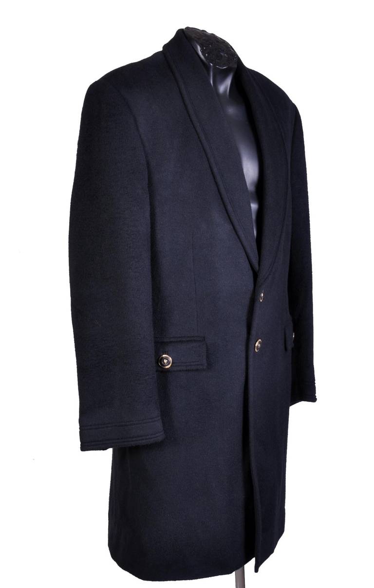 VERSACE COAT

60% wool, 30% angora, 10% cashmere

Fully lined and padded

Detailed with Versace signature buttons and hand-warming pockets. 

Very comfortable and extremely luxurious! 

Italian size 48, US 38

Please see the