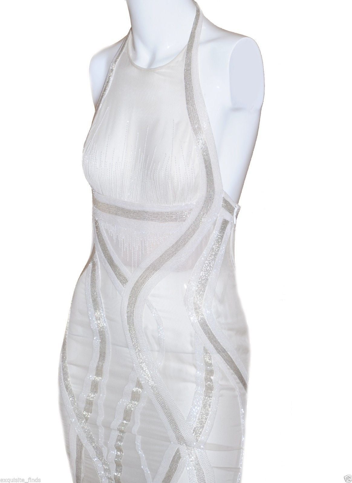 BRAND NEW VERSACE DRESS

Soft off white color, mermaid design and artfully embellished body with open back - ensure a stunning silhouette. 

Size 40

Made in Italy

New, with tags