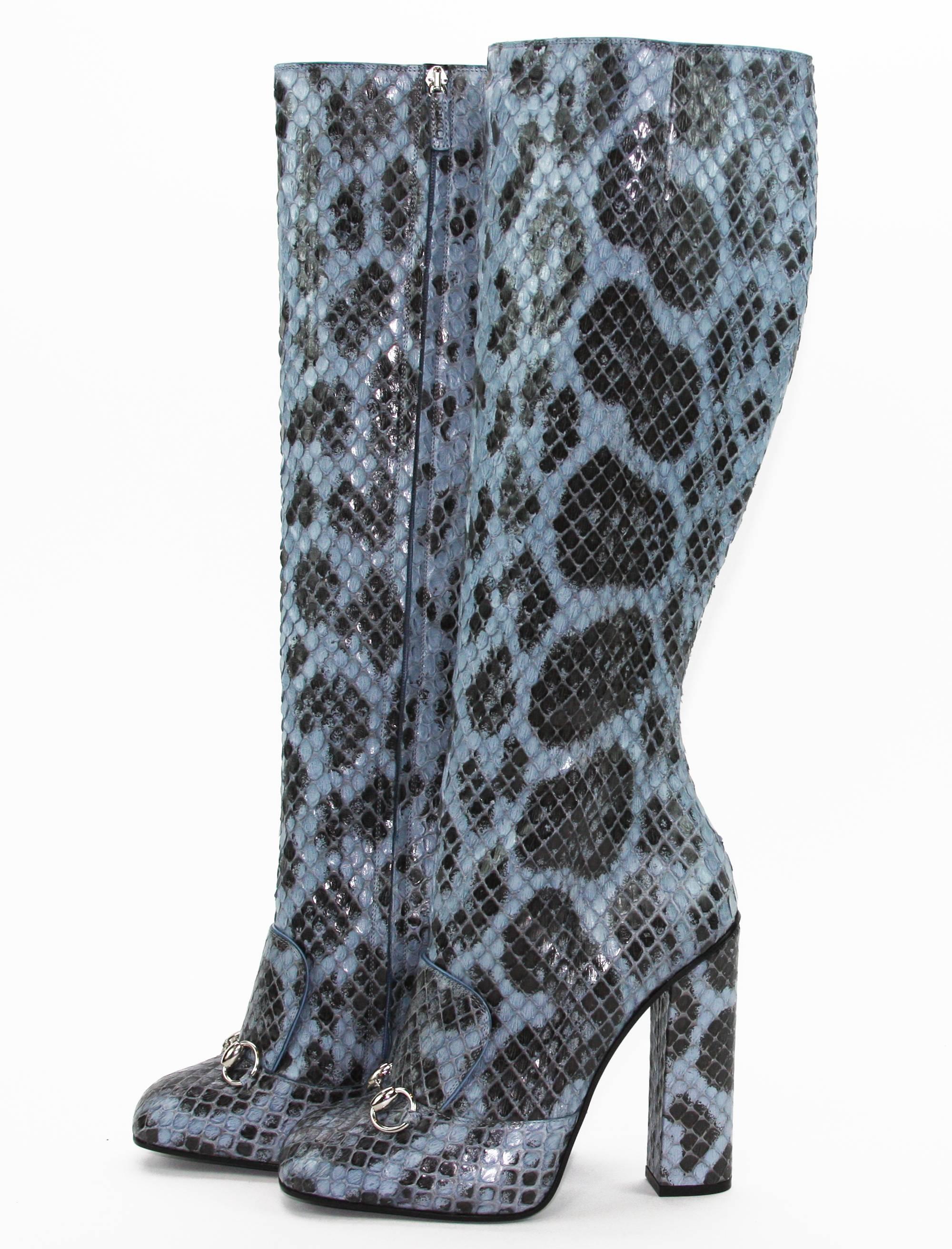 CUT SLIM TO SHOWCASE YOUR LEGS, THE SEASON'S MUST-HAVE BOOTS BREATHE RETRO-TINGED SOPHISTICATION WITH PRECIOUS CANDY-COLORED PYTHON AND A CHIC STACKED HEEL.
 
NEW GUCCI PYTHON KNEE HEIGHT BOOTS
ITALIAN SIZES 36.5 and 39.5
COLORS - BLUE,