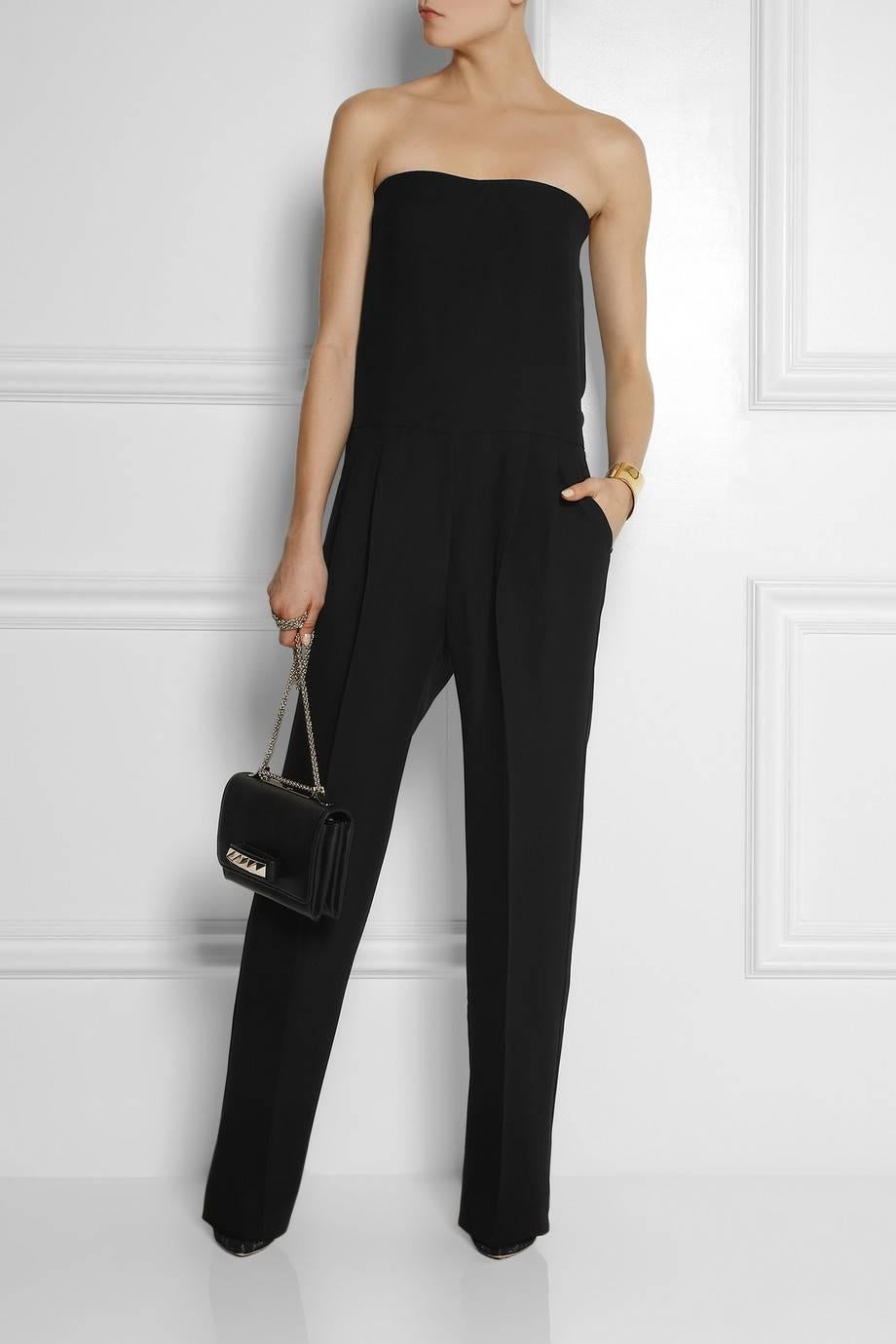 New Gucci Strapless Black Jumpsuit
Gucci's strapless black silk-cady jumpsuit is tailored for a relaxed silhouette but elegant fit. The bodice is structured so that you don't need to worry about finding the perfect bra. 
Black silk-cady.
Internal