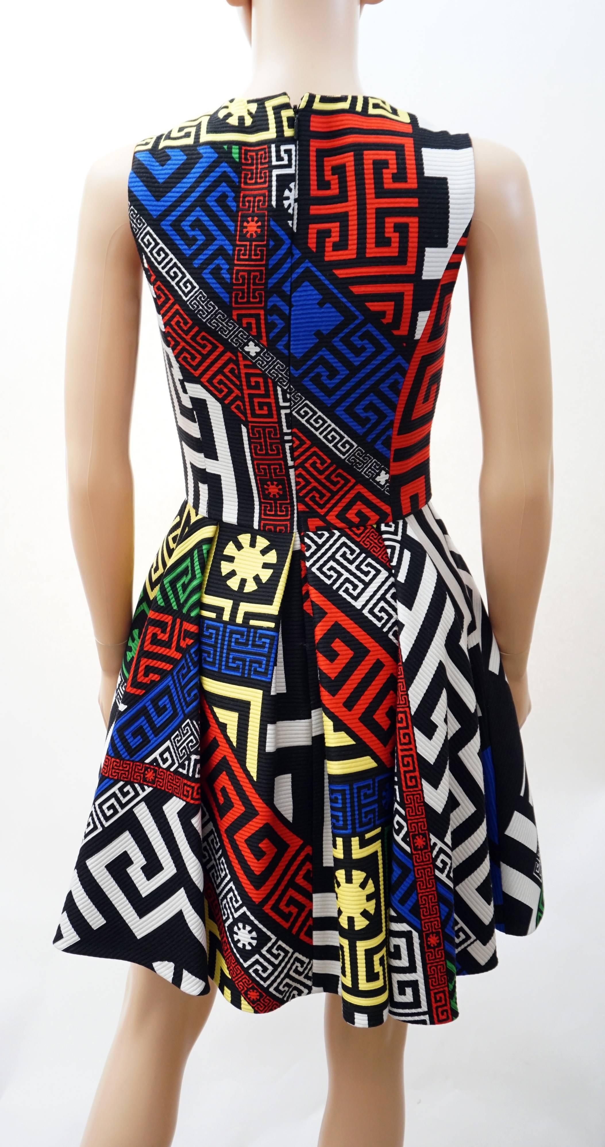 Versace 

 #Greek Puzzle Print Dress 

This dress is crafted in a wool and silk blended fabric. 

Its fitted top and flared skirt underline the waist and draw a flattering feminine silhouette.

Made in Italy.

IT Size 38

New, with tags
