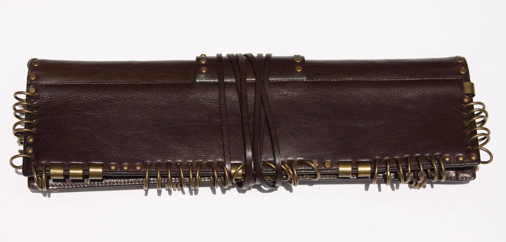 Very Rare brown leather Clutch with brass hardware designed by Tom Ford for Yves Saint Laurent dating to Spring of 2002. 
Measurements: L - 14 inches, H - 4 inches.
N 95928-000926
Brand New with Tag, Excellent Condition.
Natural aged on brass