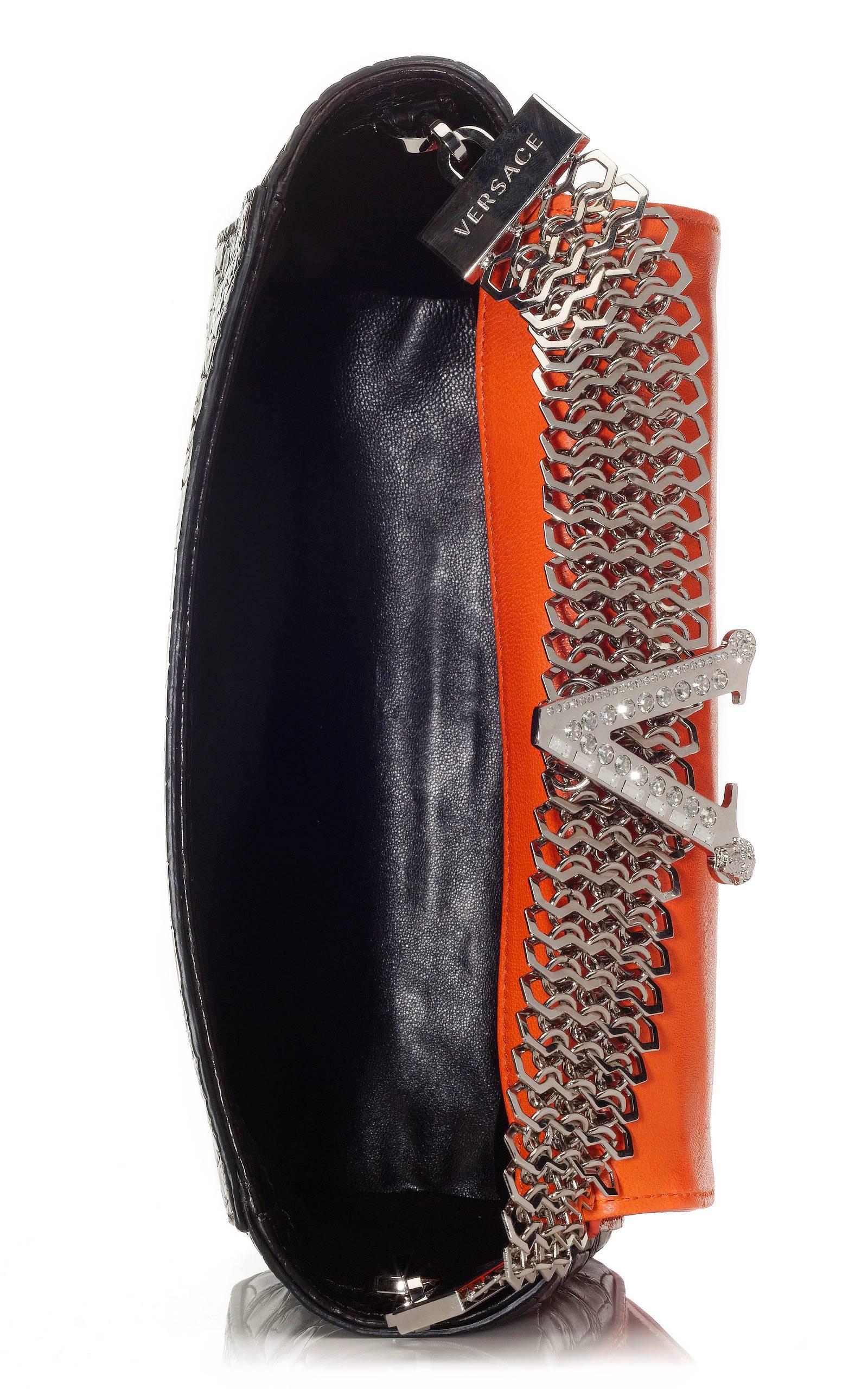 Red Versace crocodile clutch