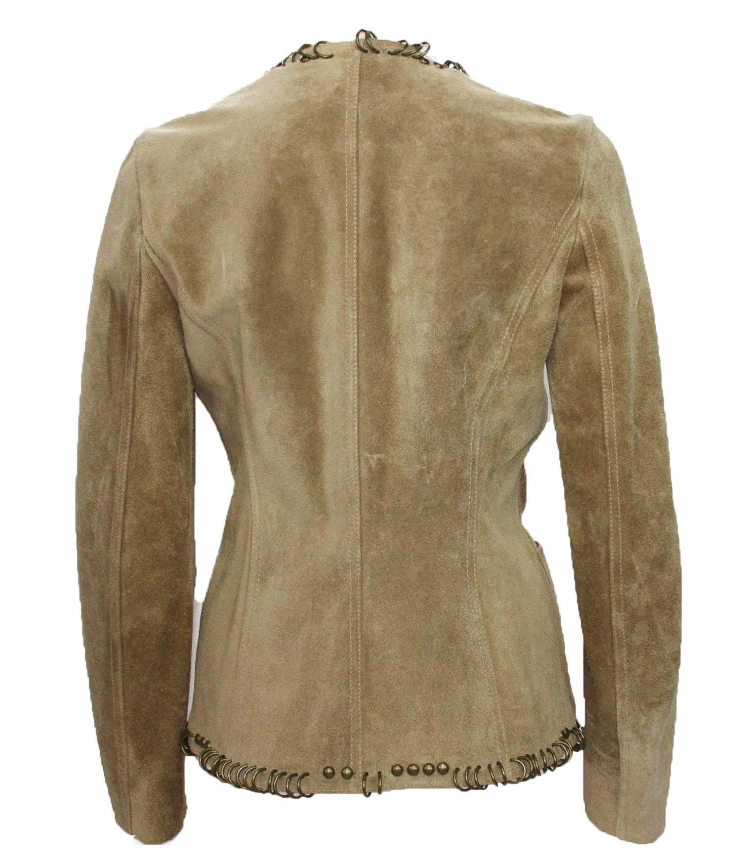 New Tom Ford for Yves Saint Laurent Suede Jacket
2002 Collection
Designer Size 36
Color - Beige
Embellished with Brass Ring and Studs
Features Patch Pockets at Hem
One Hook and Eye Closure
Measurements Flat: Length - 24 inches, Sleeve - 26
