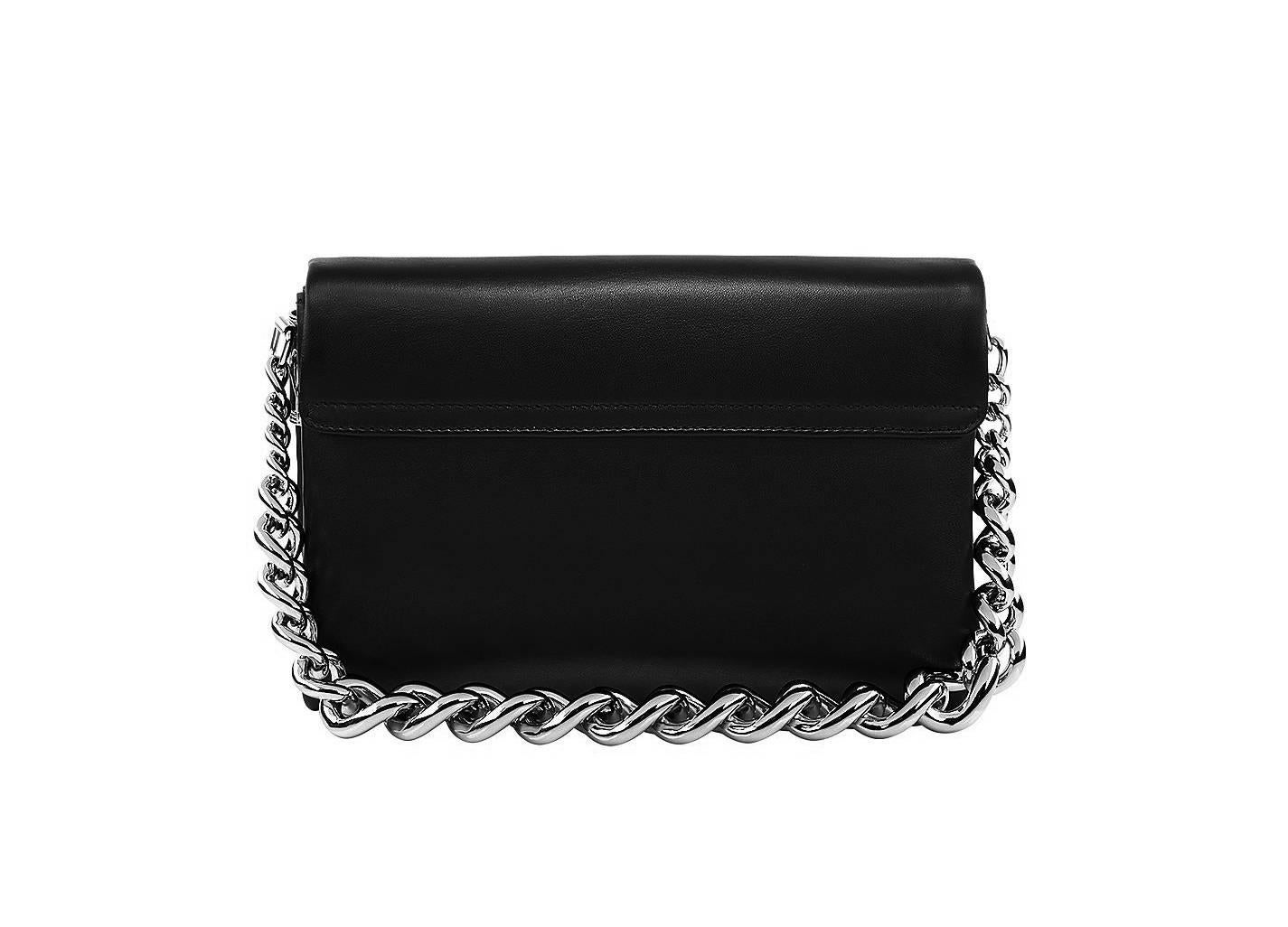VERSACE

 Black smooth nappa leather and silver-tone chain make and for a powerful combination
 in Versace's Medusa shoulder bag. 
It's shaped with two compartments and showcases the hallmark Medusa head at the front, 
plus a chunky shoulder