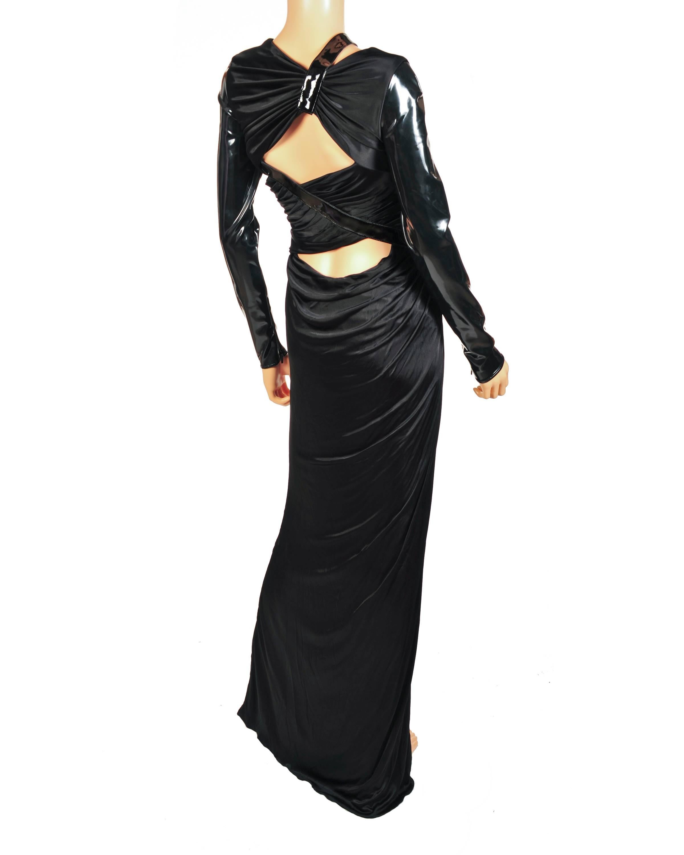 BRAND NEW VERSACE DRESS

This liquid jersey gown from Versace features cutout shoulder detail, 

full-length vinyl sleeves with zip accents, 

and a floor-sweeping skirt with thigh-high slit.

Size 40 - US 4

Made in Italy

New, with tags