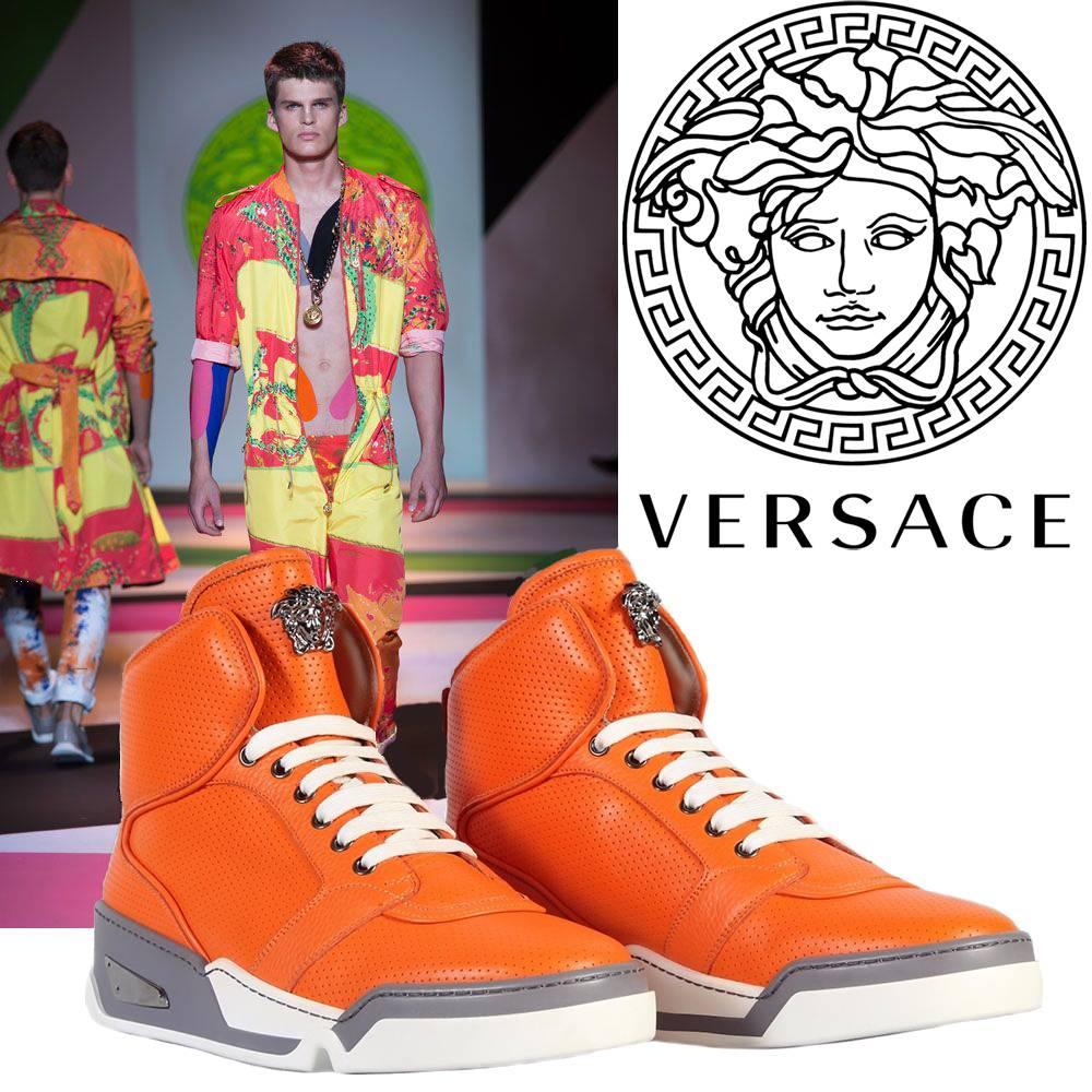 BRAND NEW 

VERSACE 

Men's Orange Perforated Leather  High-Top Sneakers

Made in Italy
 
Italian sizes: 41, 42, 43, 44, 45

Brand New, in the Box. Comes with dust Bag.
