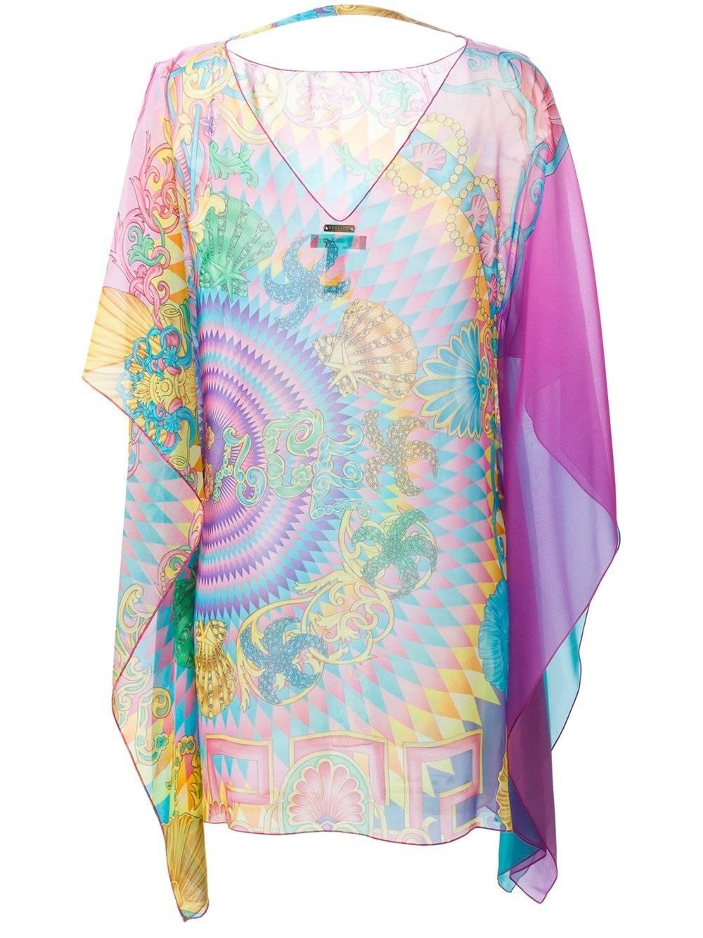 Versace

Multicolored silk sea world and digital barocco print sheer silk tunic dress. 

Details:
Material: 100% Silk
Color: Multi
Unlined
Made in Italy

IT Size 42 - US M

Length 33
