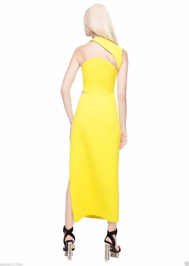 New Versace Yellow Cut Out Long Dress as seen on Minnie For Sale at 1stDibs | 2613130933 