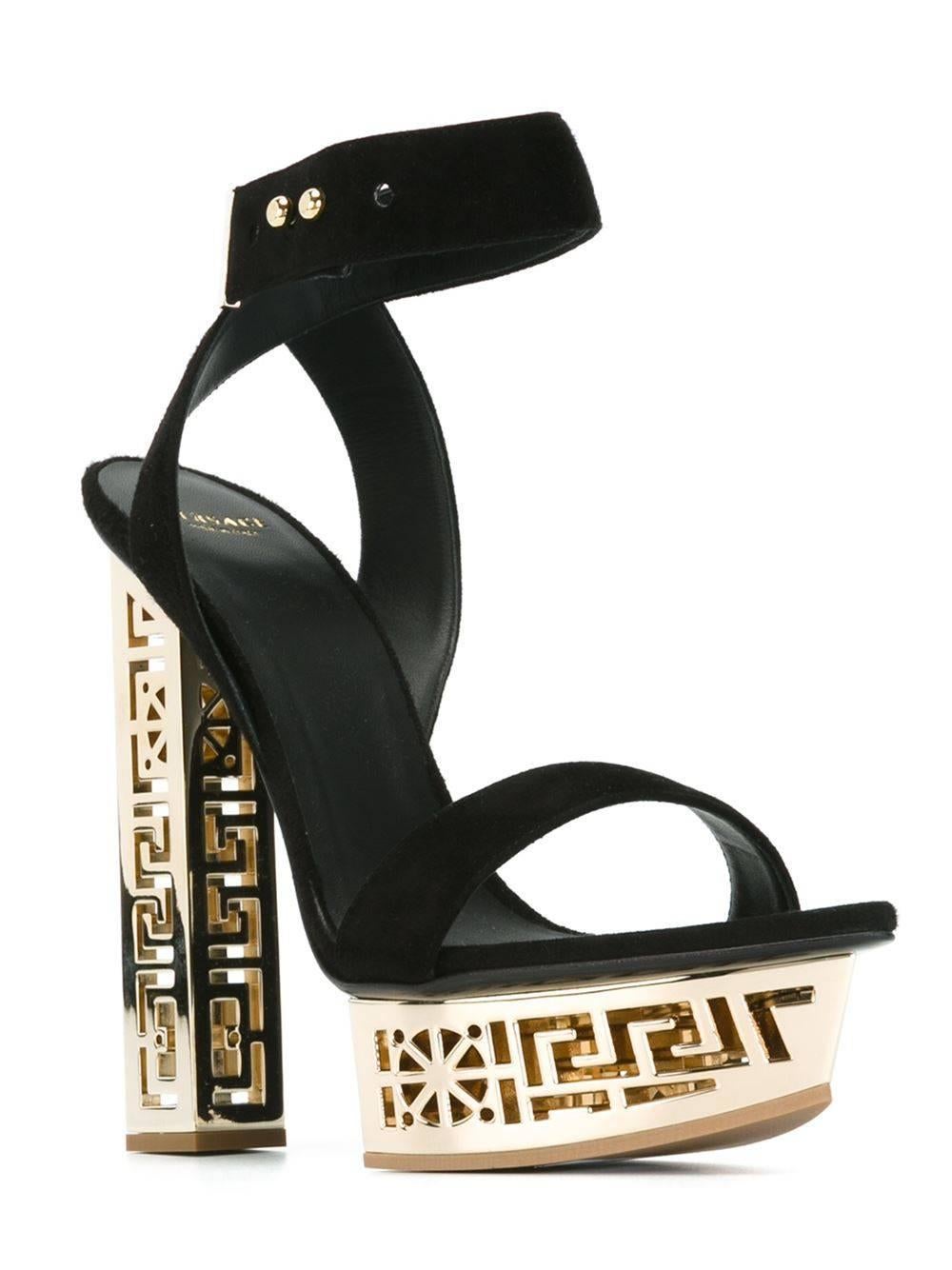 VERSACE SANDALS

Get a stylish lift with these sandals featuring a #GREEK motif metallic heel and platform. 

They combine Italian craftsmanship and daring Versace design. 

Suede

Metallic heel and platform

Made in Italy.

IT Size 41 - US 11

New,