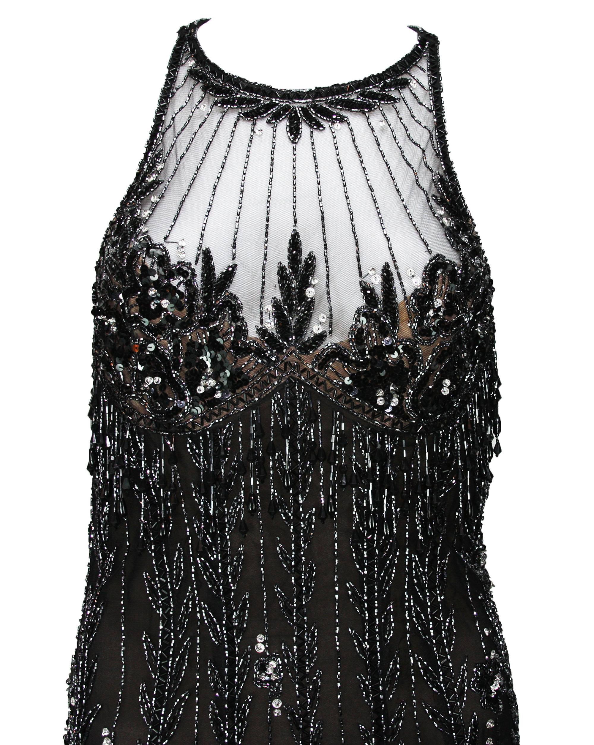 Bob Mackie Fully Beaded Mini Dress

Size 8

Measurements flat:

Length - 34