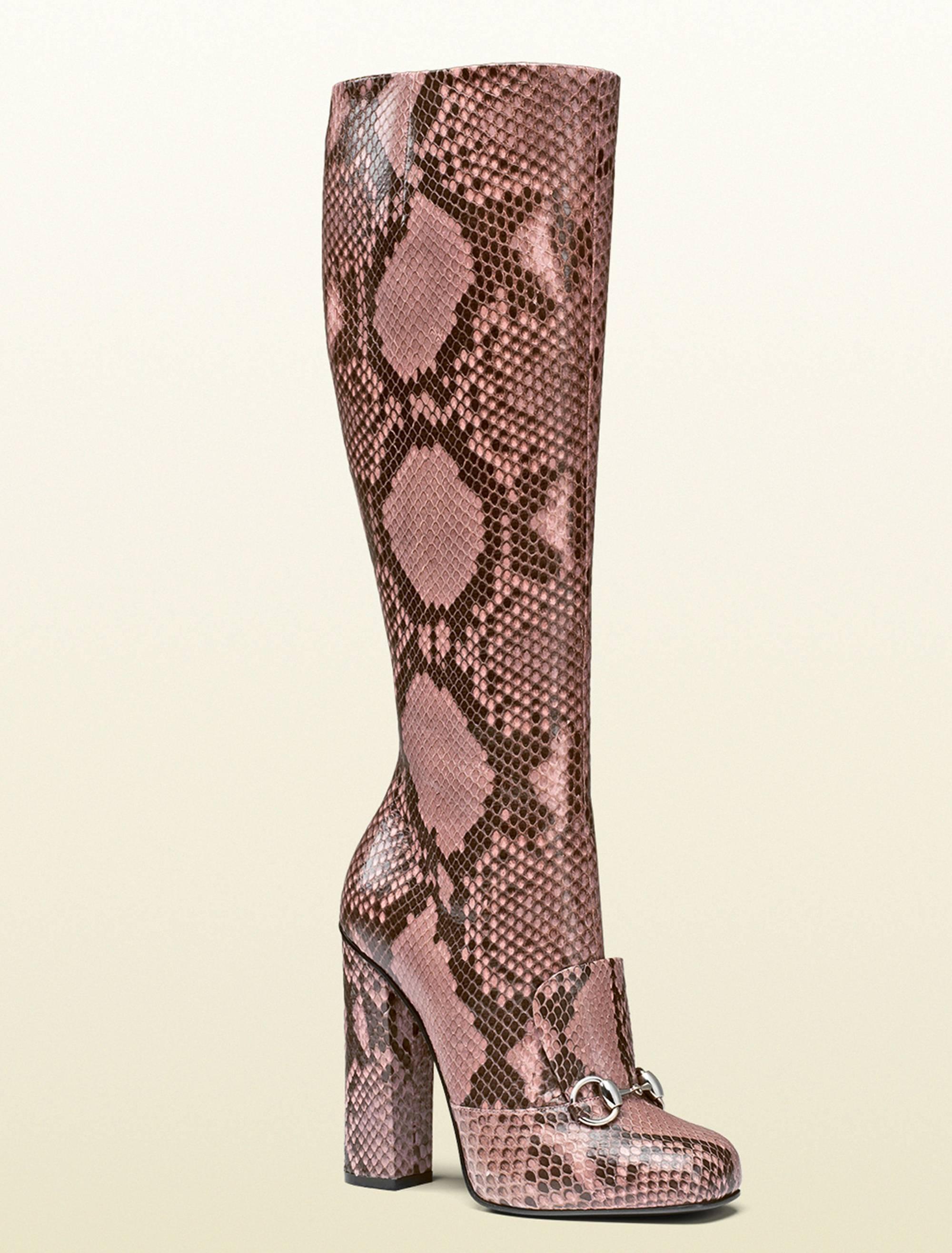 CUT SLIM TO SHOWCASE YOUR LEGS, THE SEASON'S MUST-HAVE BOOTS BREATHE RETRO-TINGED SOPHISTICATION WITH PRECIOUS CANDY-COLORED PYTHON AND A CHIC STACKED HEEL.
 
NEW GUCCI PYTHON KNEE HEIGHT BOOTS
IT SIZES: 36.5 – US 6.5, 39.5 - US 9.5
COLORS -