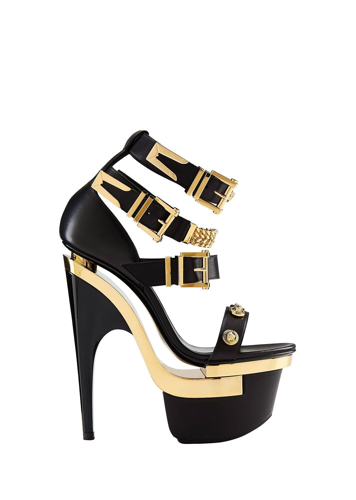 VERSACE 

Studded platform sandals

Three ankle buckles, gold sole plaques, platform at front, stiletto curved heel, heel measures approx. 16 cm

100% leather
 
IT Size 35 - US 5

Made in Italy

Brand new. In original VERSACE box.

  