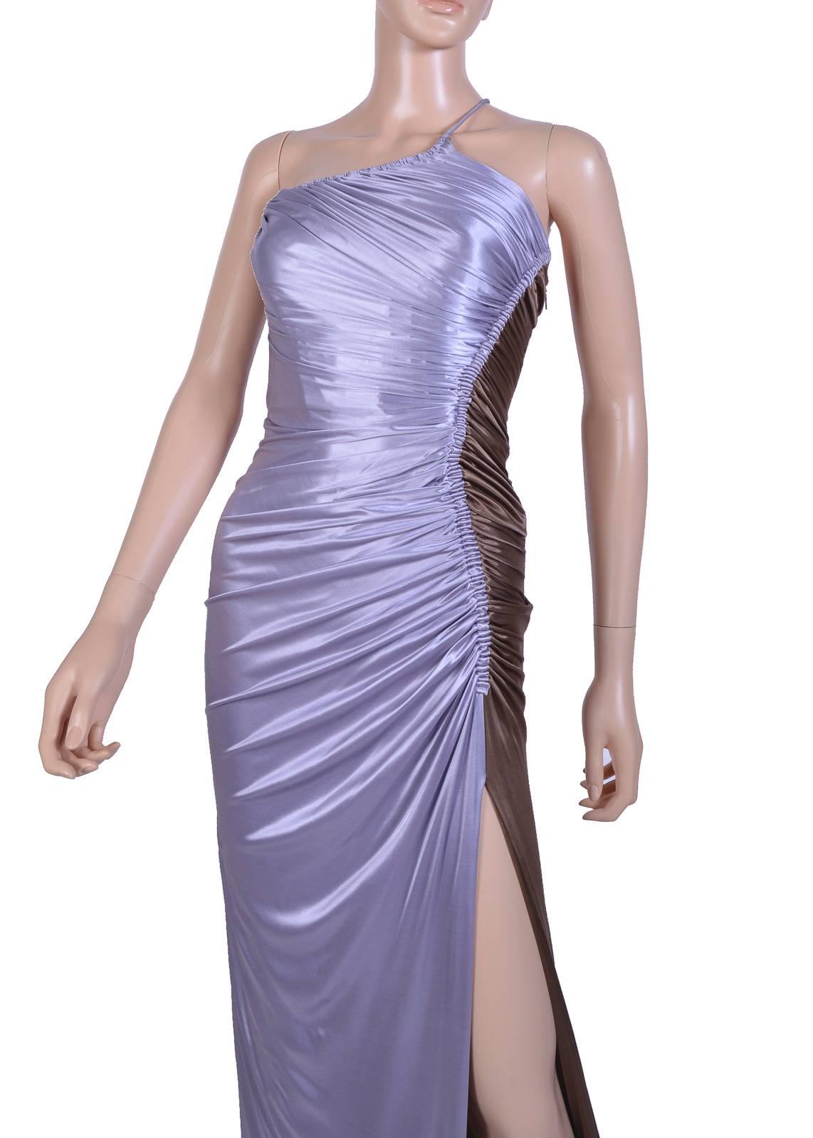 New VERSACE Ruched Color Block Long Dress 

Versace's eveningwear is exquisite. 

This color block gown has been beautifully ruched and finished with long sexy slit

Liquid jersey

IT Size 38 

Made in Italy

New, with tags