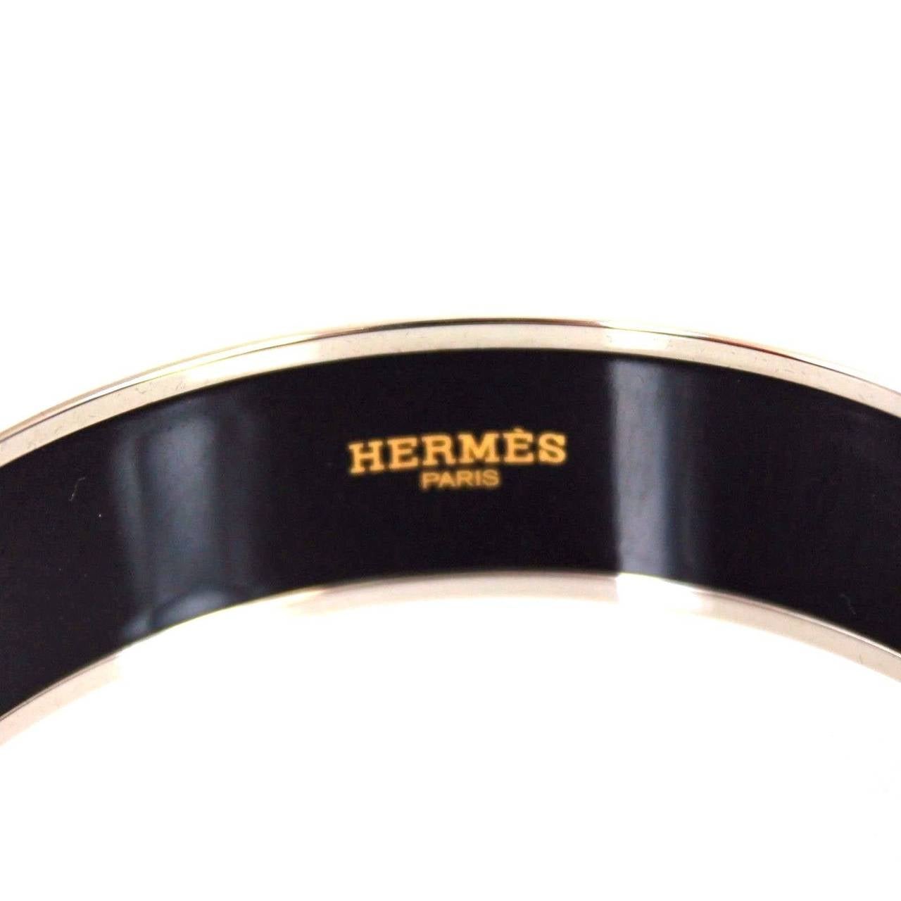Hermes wide printed enamel bracelet

Palladium plated, 1