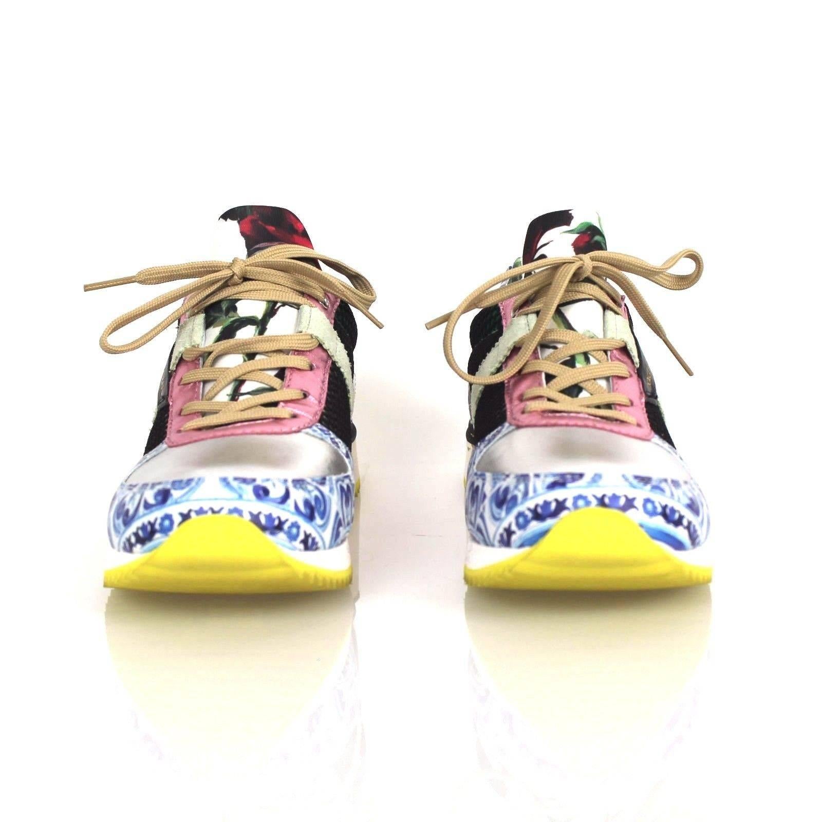 These exceptionally bold and eye catching sneakers features: Removable insole, lace-up style, textile and leather upper and lining/rubber sole, by Dolce&Gabbana; made in Italy, salon shoes.

Conditions: Brand new, but is a display item so has
