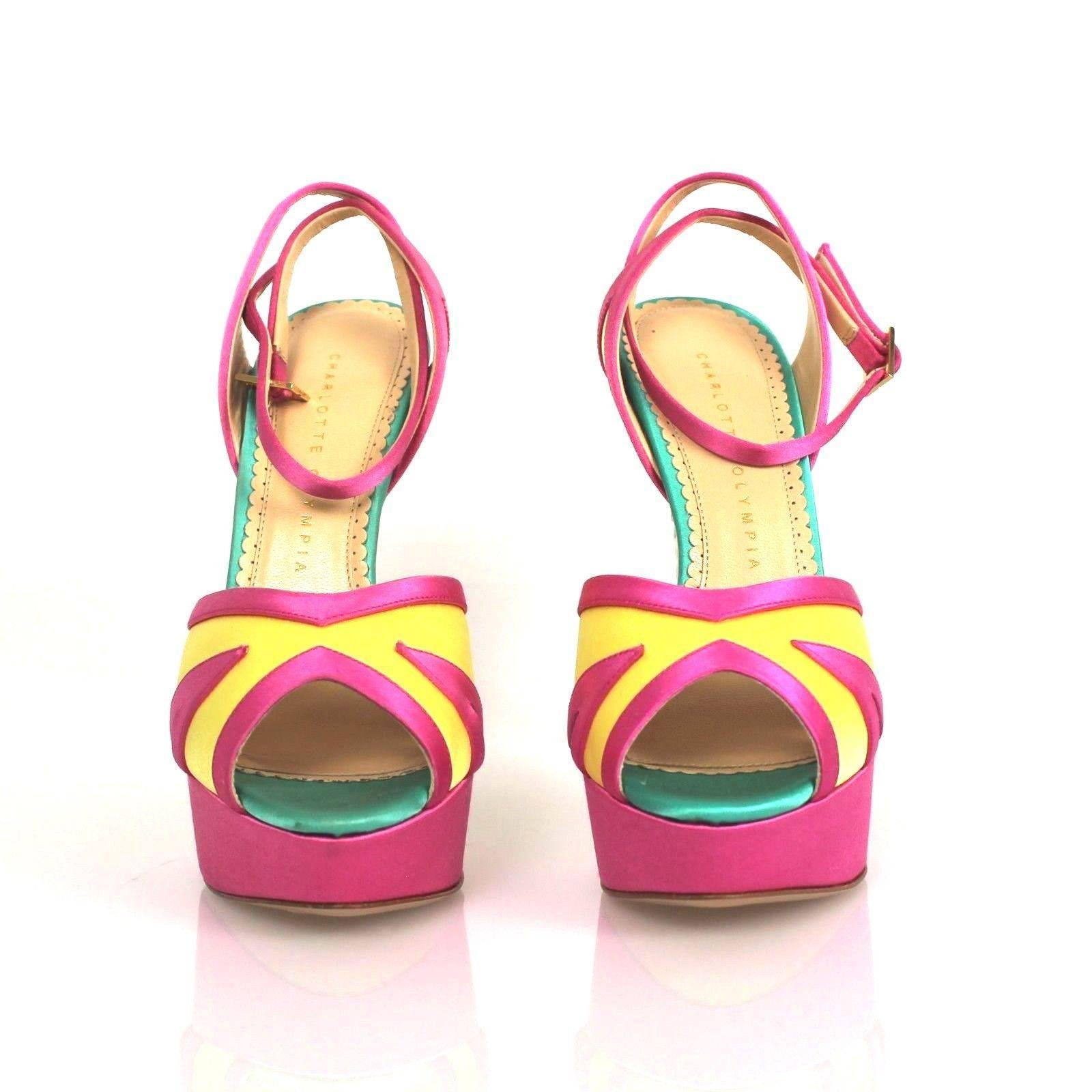 Multicoloured leather 'Apache Eagle' sandals from Charlotte Olympia featuring an open toe, crossover straps to the front, a brand embossed insole, an ankle strap with a side buckle fastening, a high stiletto heel and a platform sole.

Conditions: