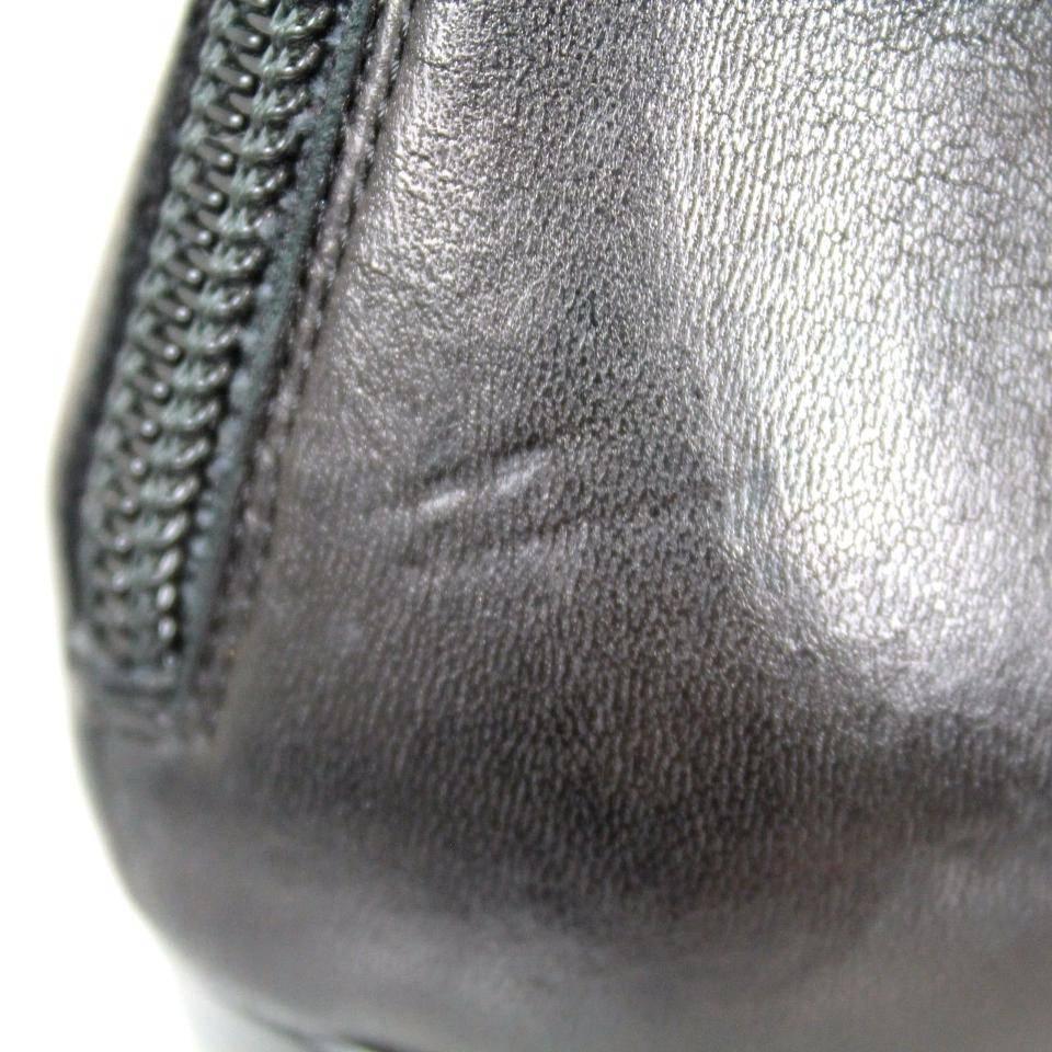 CHANEL Leather Cap Toe Gold Cc Logo Embellished Ankle Heel Black Boots ...